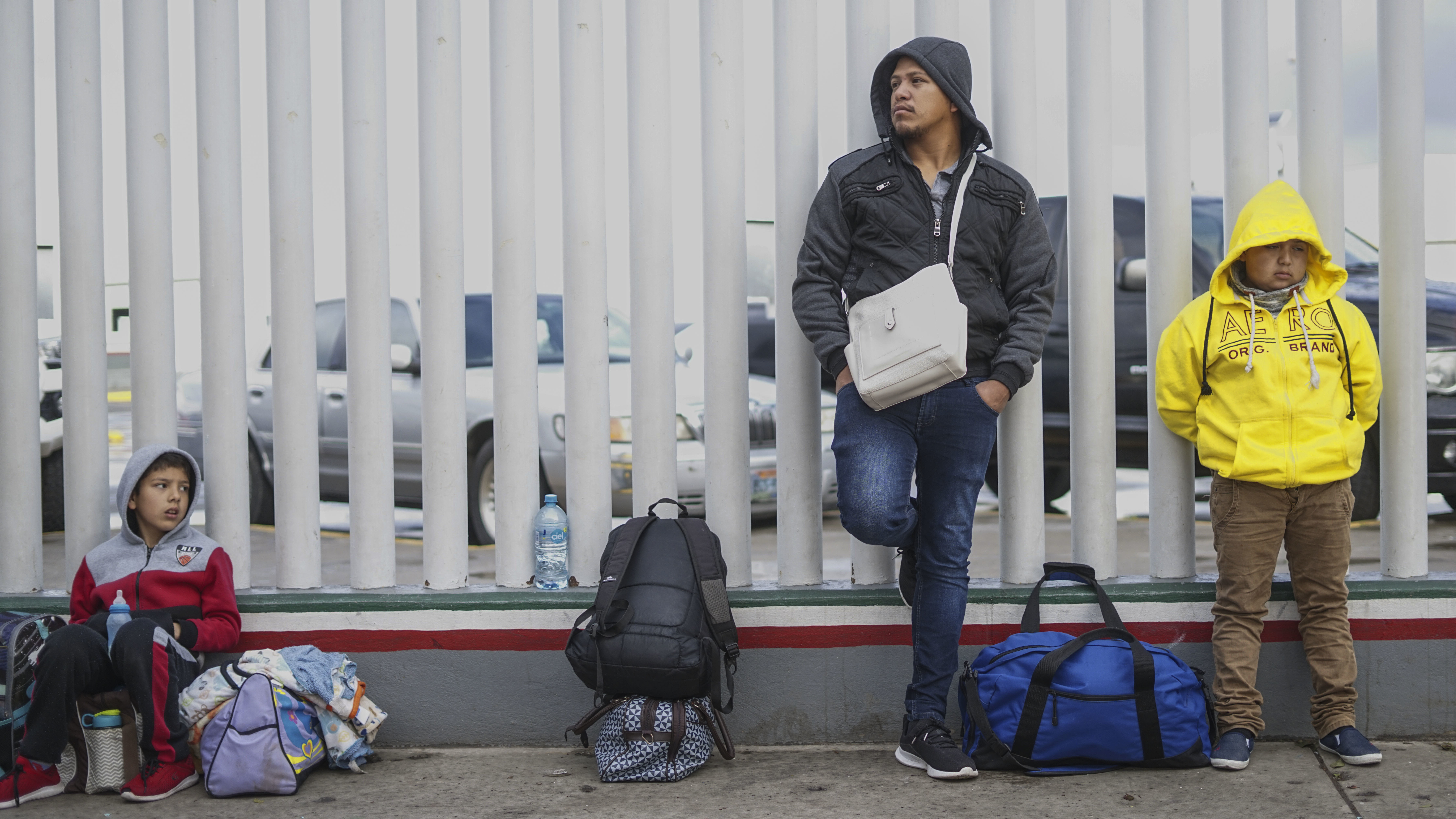 Honduran migrants wait in line to plead their asylum cases earlier this month at a border crossing in Tijuana, Mexico. (Getty Images)