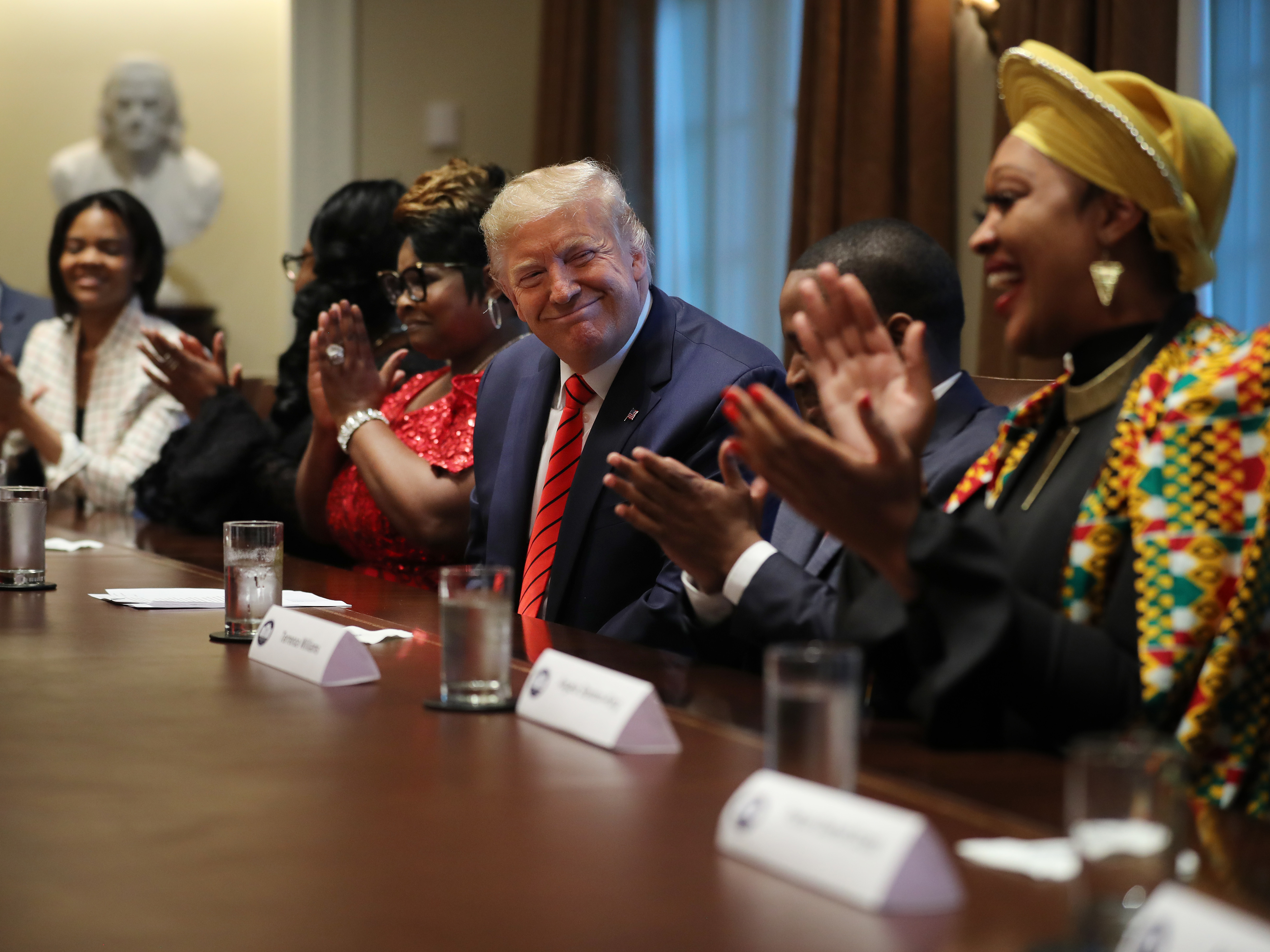 President Trump smiles at Angela Stanton-King at an African American history event at the White House. A few days later, Stanton-King was a speaker at a Black Voices for Trump event in Milwaukee. (Getty Images)