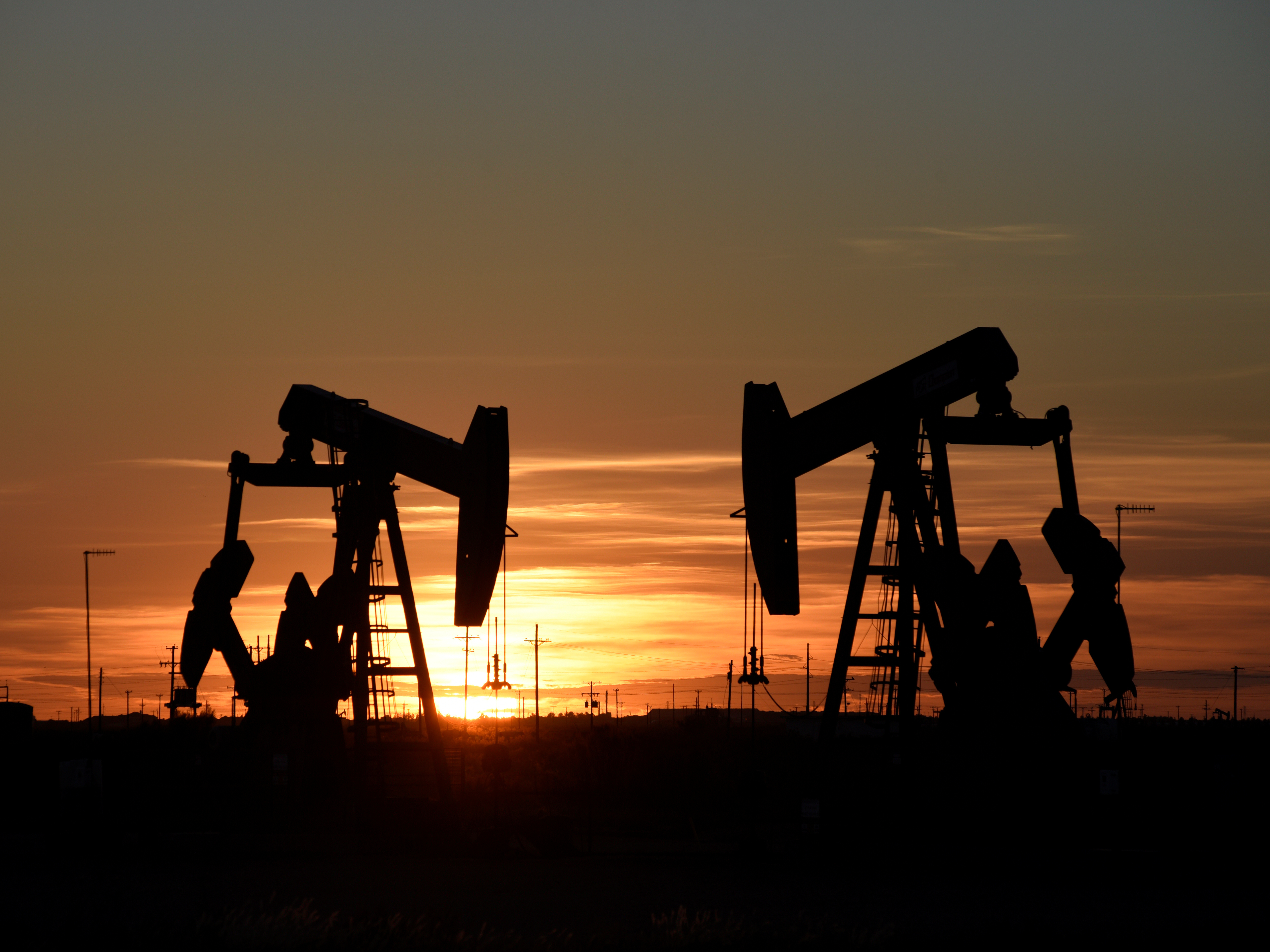 Oil prices dropped 30% Sunday after Saudi Arabia announced it would boost production and cut prices. (Reuters)