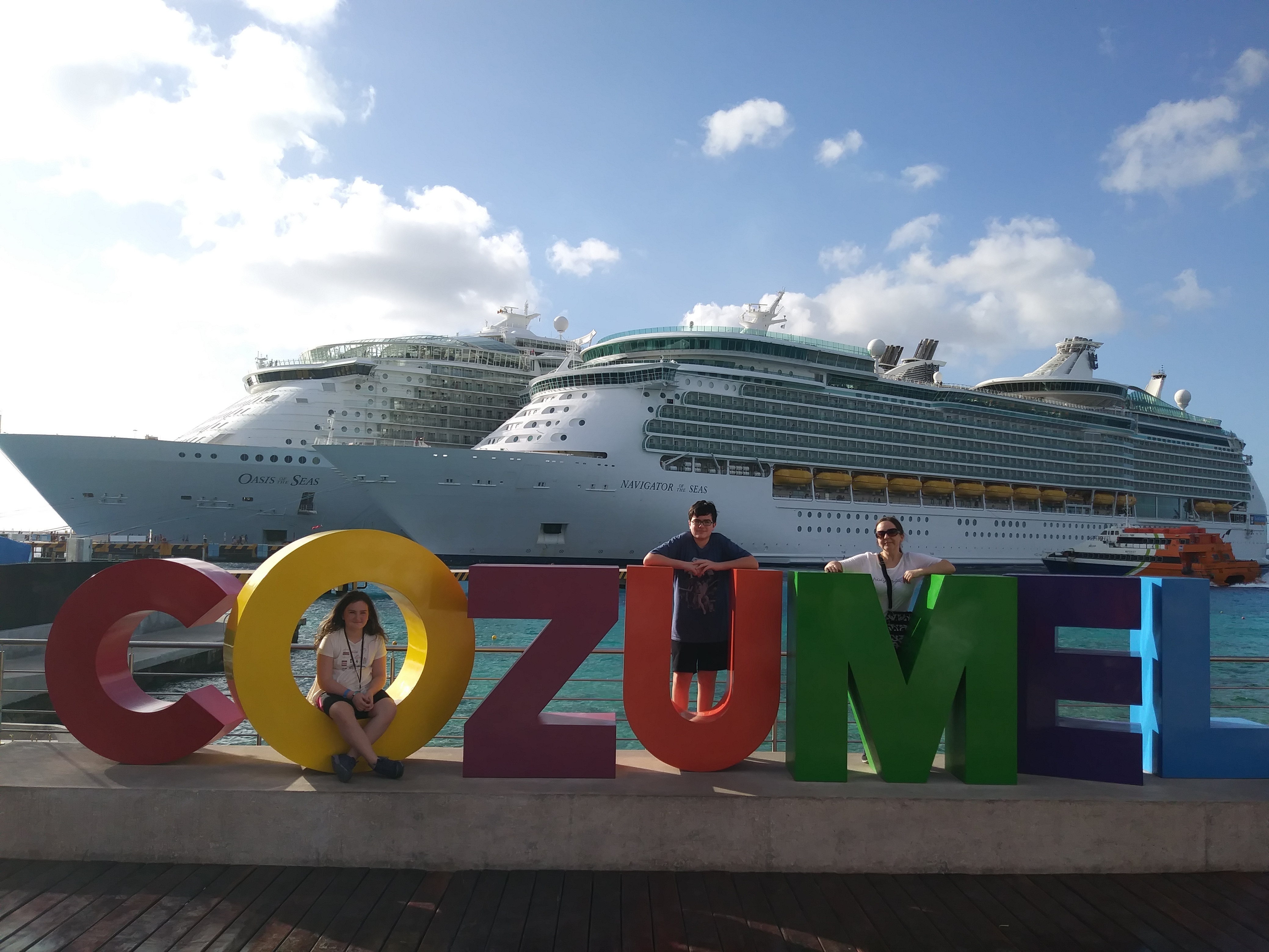 Linda Nalbandian and her children on a previous cruise. The family has struggled to decide whether to cancel an upcoming vacation in April. (Courtesy of Linda Nalbandian)