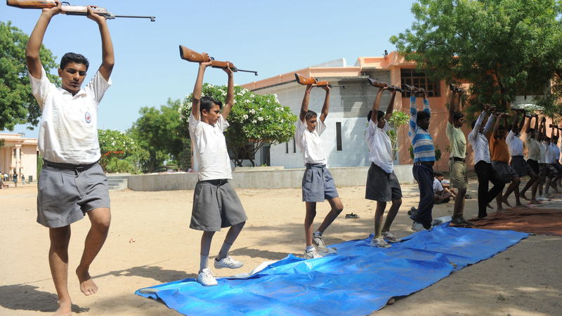 An air rifle training session at an RSS youth camp on the outskirts of Ahmedabad. Youth camps like these draw on the ideology of Hindutva and emphasize military discipline and Hindu scripture.