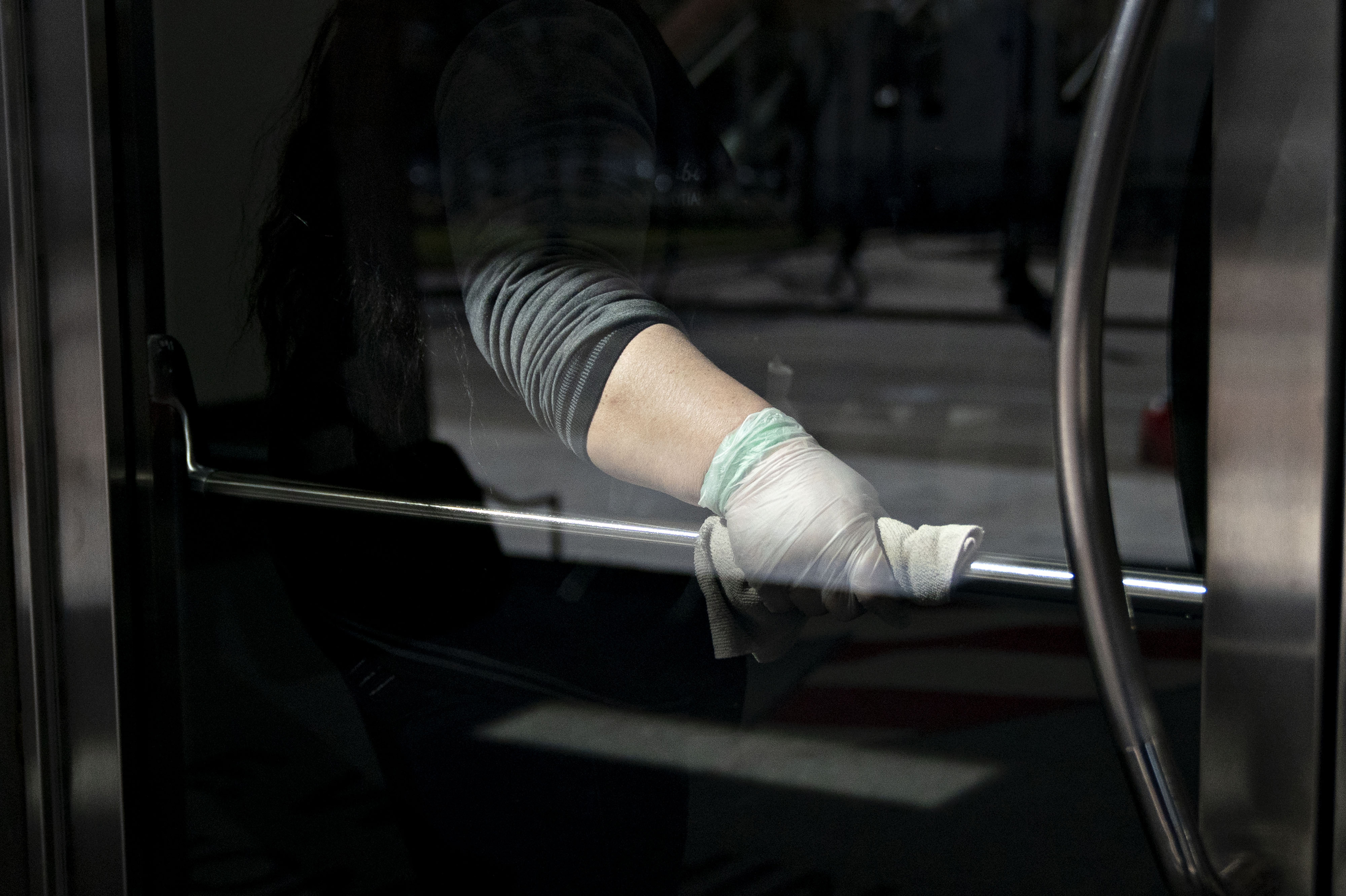When an infected person touches a surface, like a door handle, there's a risk they leave viruses stuck there that can live on for two to three days. (Bloomberg via Getty Images)