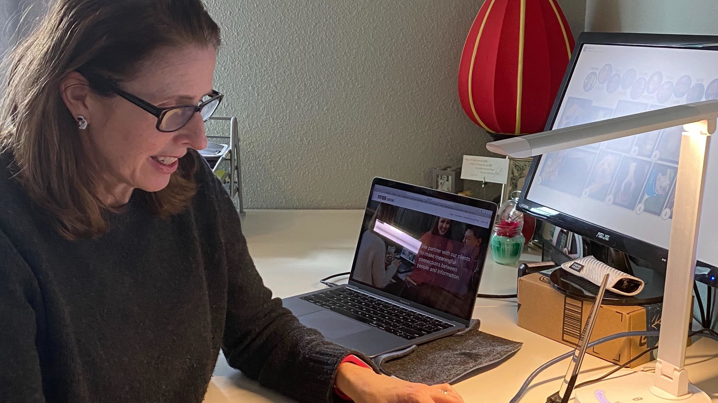 Kate Walton, the CEO of Steyer Content, in her home office on Bainbridge Island, a ferry ride away from Seattle. Her company does $9 million in sales annually, providing marketing materials for companies such as Microsoft. (Anna Walton)