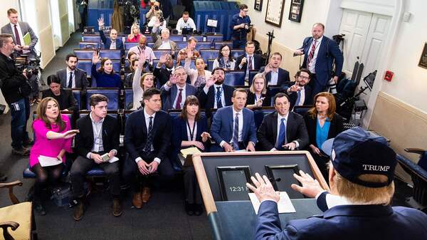 President Trump takes questions from reporters on Saturday. The White House is holding daily briefings to explain how the administration is dealing with the spread of the coronavirus.