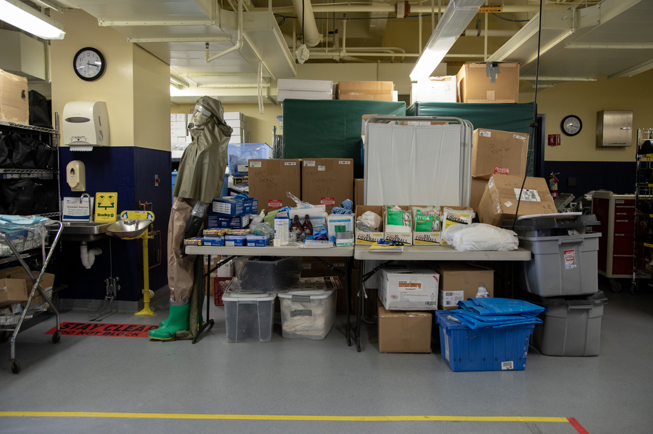 MedStar Washington Hospital Center's "ready room" in Washington, D.C., has mostly been used to house emergency supplies — but some storage carts have been moved out to make way for patient assessment stations. (Ryan Kellman/NPR)
