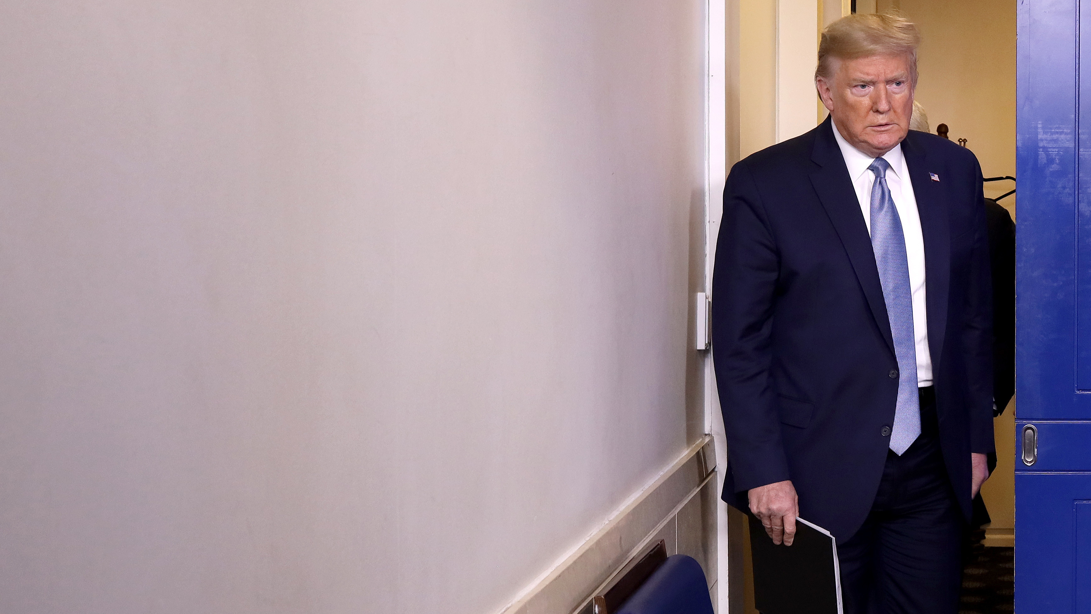 President Trump arrives in the press briefing room to speak about the coronavirus at the White House on Monday. (Getty Images)