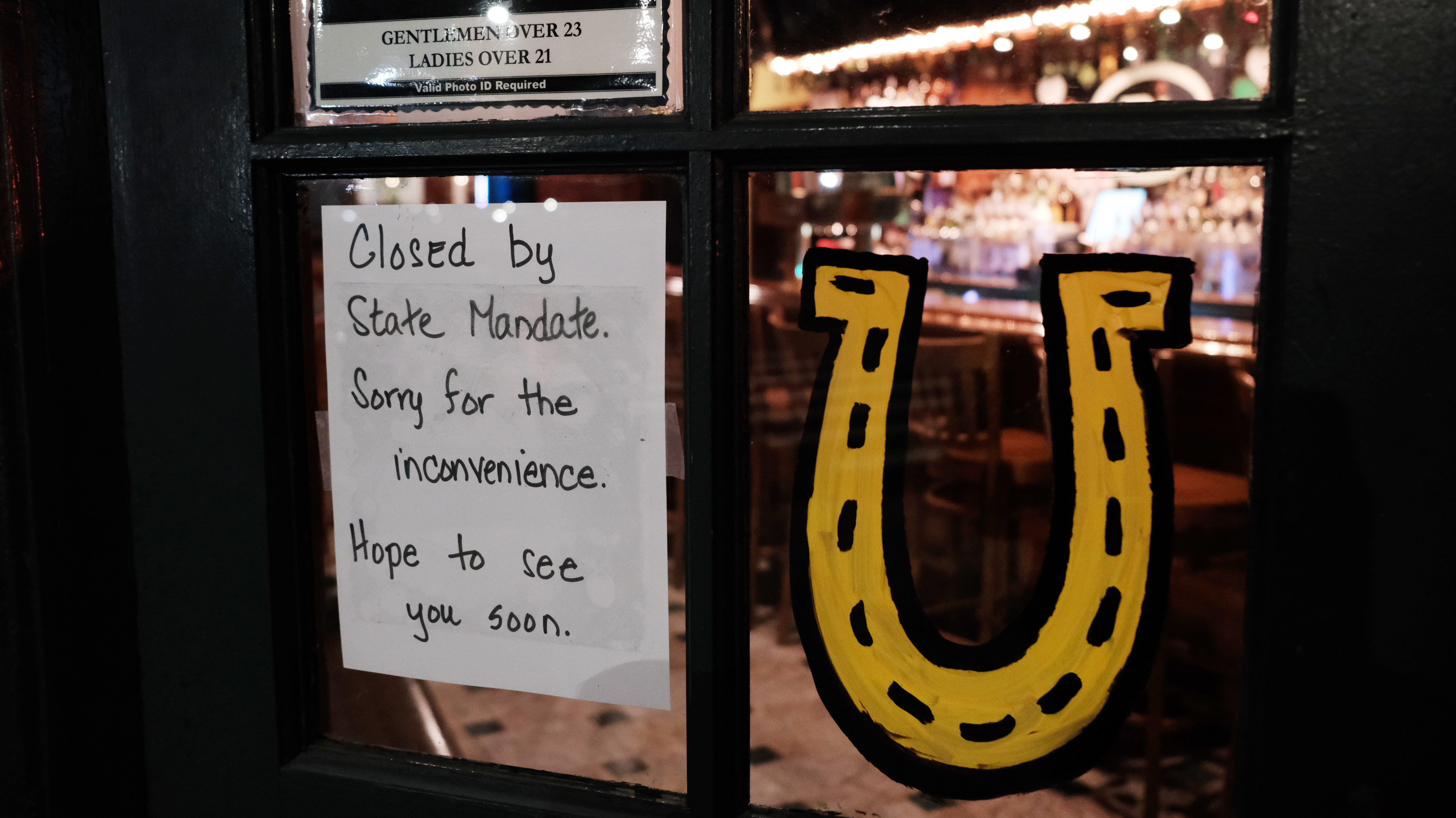 A Brooklyn restaurant tells would-be customers it is closed on Sunday, after a decree that all bars and restaurants in New York City shut down. (Getty Images)
