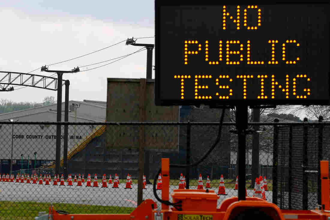 MARIETTA, GEORGIA - MARCH 18: A sign is visible outside of Jim R. Miller Park during the first day of drive-thru coronavirus testing on March 18, 2020 in Marietta, Georgia. The site is not open to the public, and those being tested for COVID-19 must have referrals from health officials. (Photo by Kevin C. Cox/Getty Images)