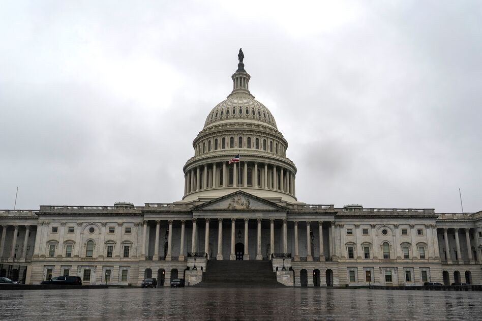 The $2 trillion relief plan that passed in the Senate on Wednesday night marks the largest rescue package in American history. (Alex Edelman/AFP via Getty Images)
