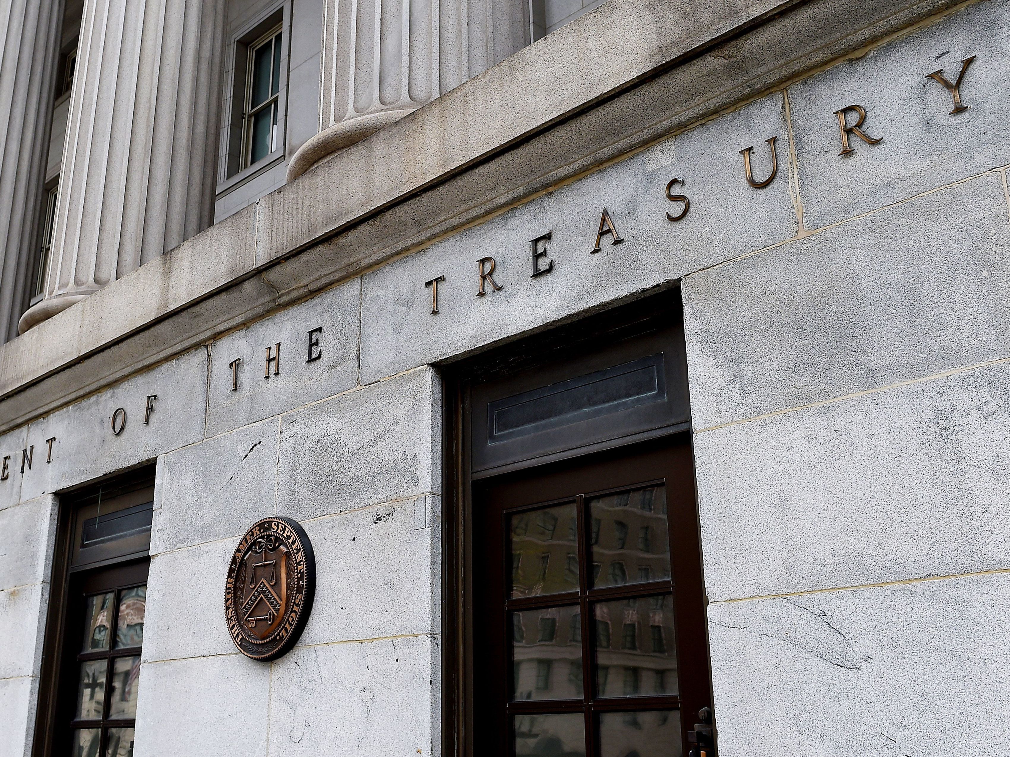 The economic rescue package just passed by Congress will push this year's budget deficit above $3 trillion. (AFP via Getty Images)