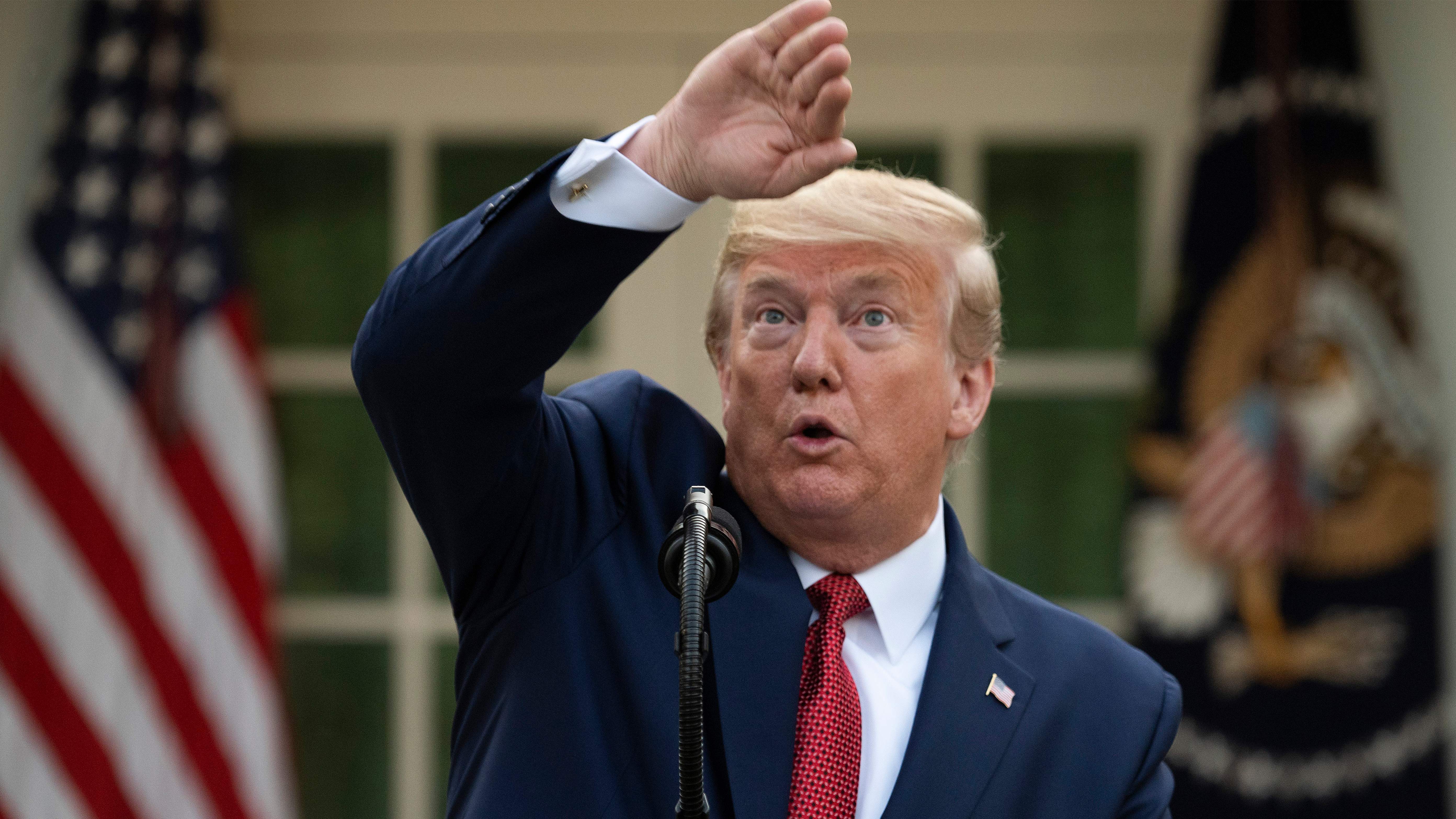 President Trump on Sunday described models showing U.S. coronavirus cases could peak in two weeks — at Easter — a time when he had hoped things would be back to normal for parts of the country. (AFP via Getty Images)