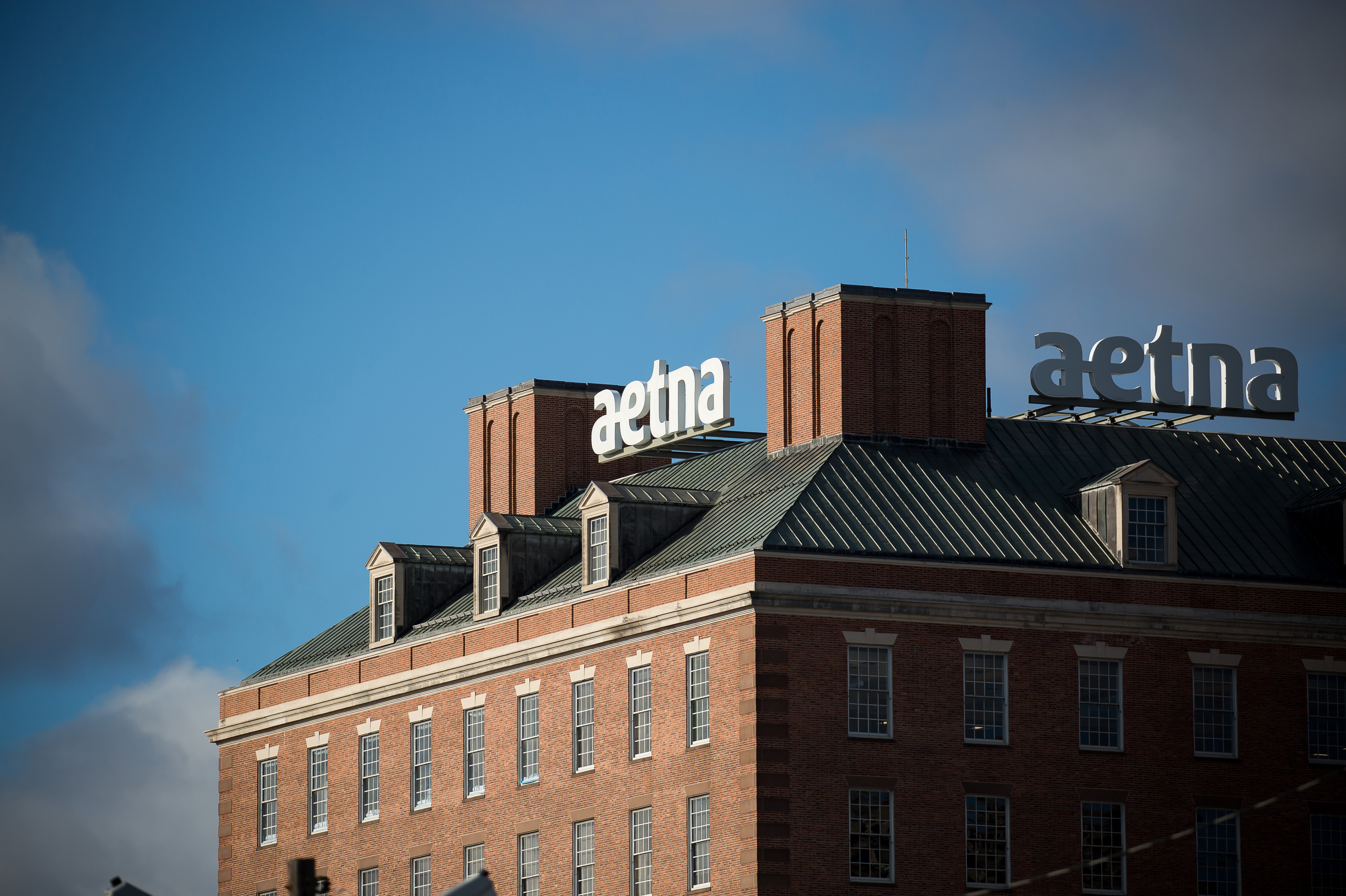 Aetna was the first insurer to announce its plan to help shield patients with COVID-19 from high medical bills. But out-of-network charges and other surprise bills remain a risk, say advocates for patients. (Bloomberg via Getty Images)