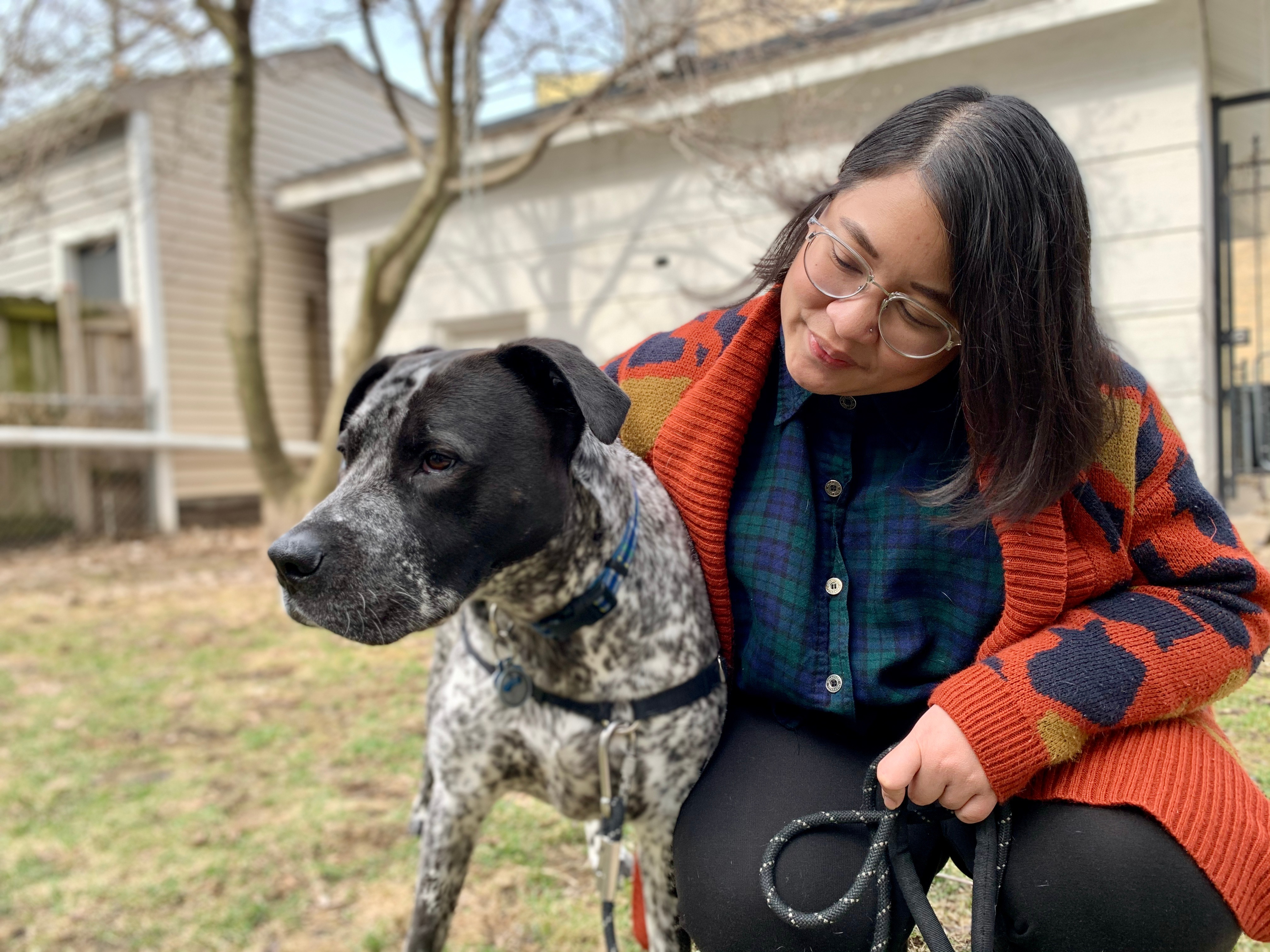 Soukprida Phetmisy, pictured here with her dog, Wilbur, says she has experienced more anti-Asian attacks during the past two weeks of the COVID-19 crisis than she has in 10 years. (WBEZ)