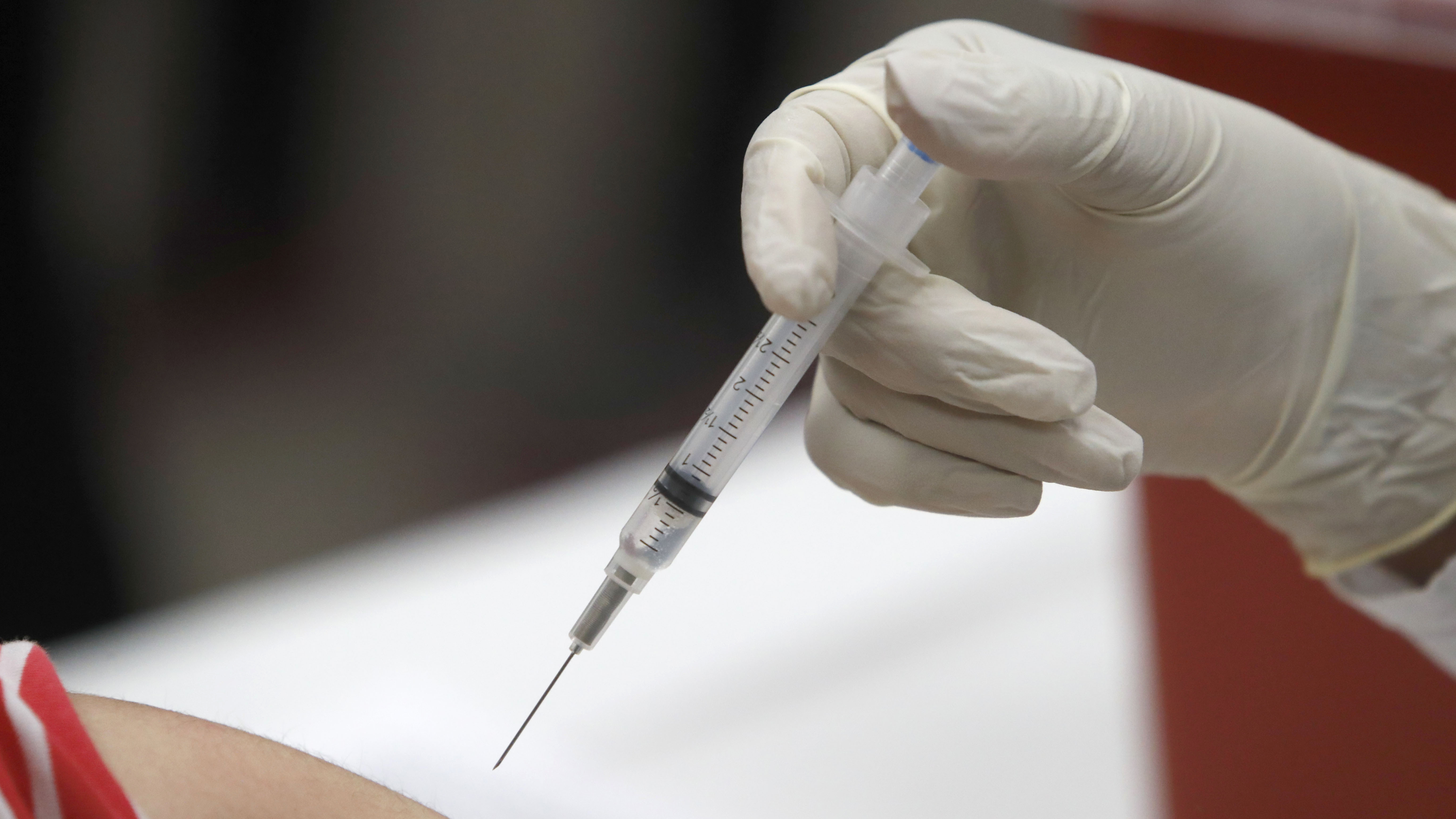 A patient receiving a flu vaccination in Mesquite, Texas, in January. Amid the COVID-19 epidemic, there