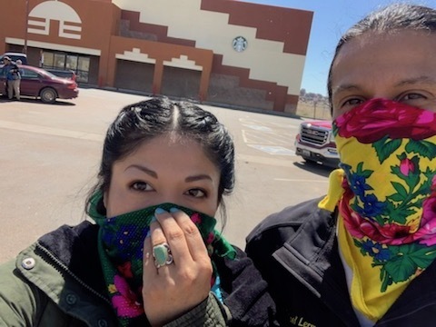 Adrian Lerma, and her husband Michael, stand outside the grocery store in Window Rock, Ariz. They're buying food for elders in their community. (Courtesy of Adrian Lerma)