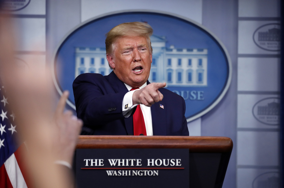 President Trump speaks about the coronavirus during Friday's briefing at the White House. (Alex Brandon/AP)