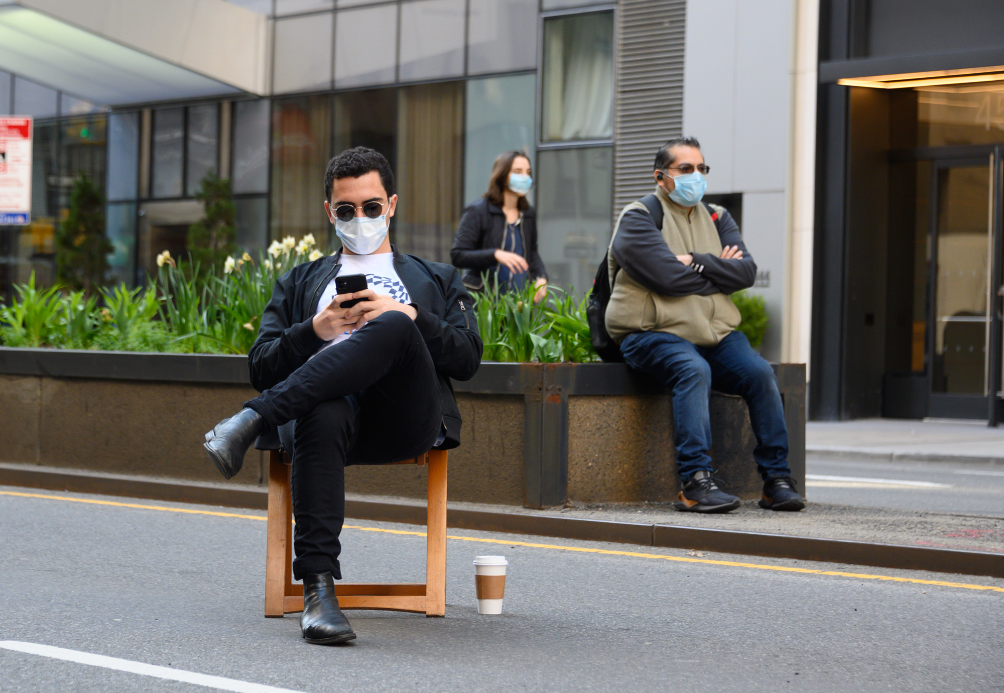 New Yorkers on Manhattan's Park Avenue cover their faces last week. (Getty Images)