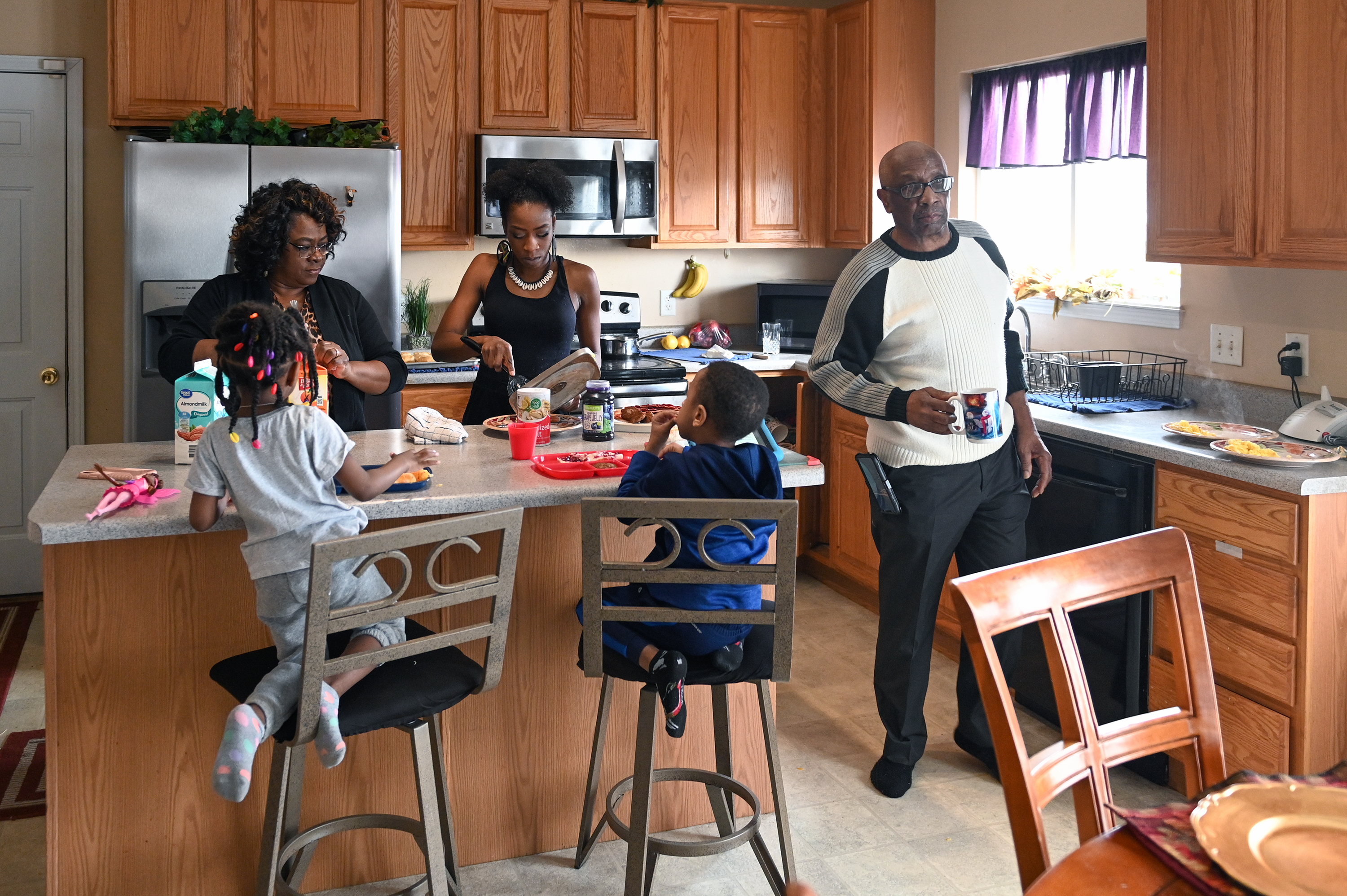 More than 64 million Americans live in multigenerational households. Despite the emotional and financial benefits of living together, families like the Walkers, at home in Florissant, Mo., face a particular set of challenges as COVID-19 continues to spread. (Michael B. Thomas for KHN)