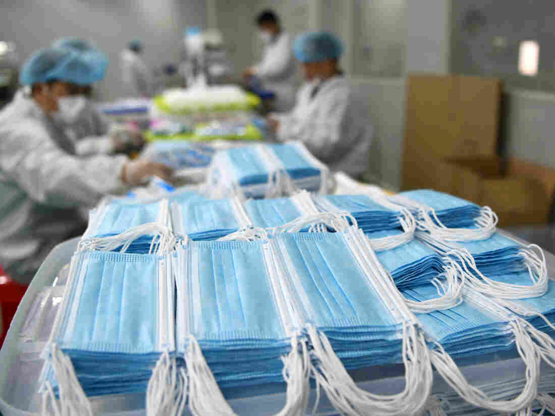 NANCHANG, CHINA - Workers make face masks for export in a railway subsidiary in Nanchang city in central China's Jiangxi province (Photo credit: Feature China/Barcroft Media via Getty Images)