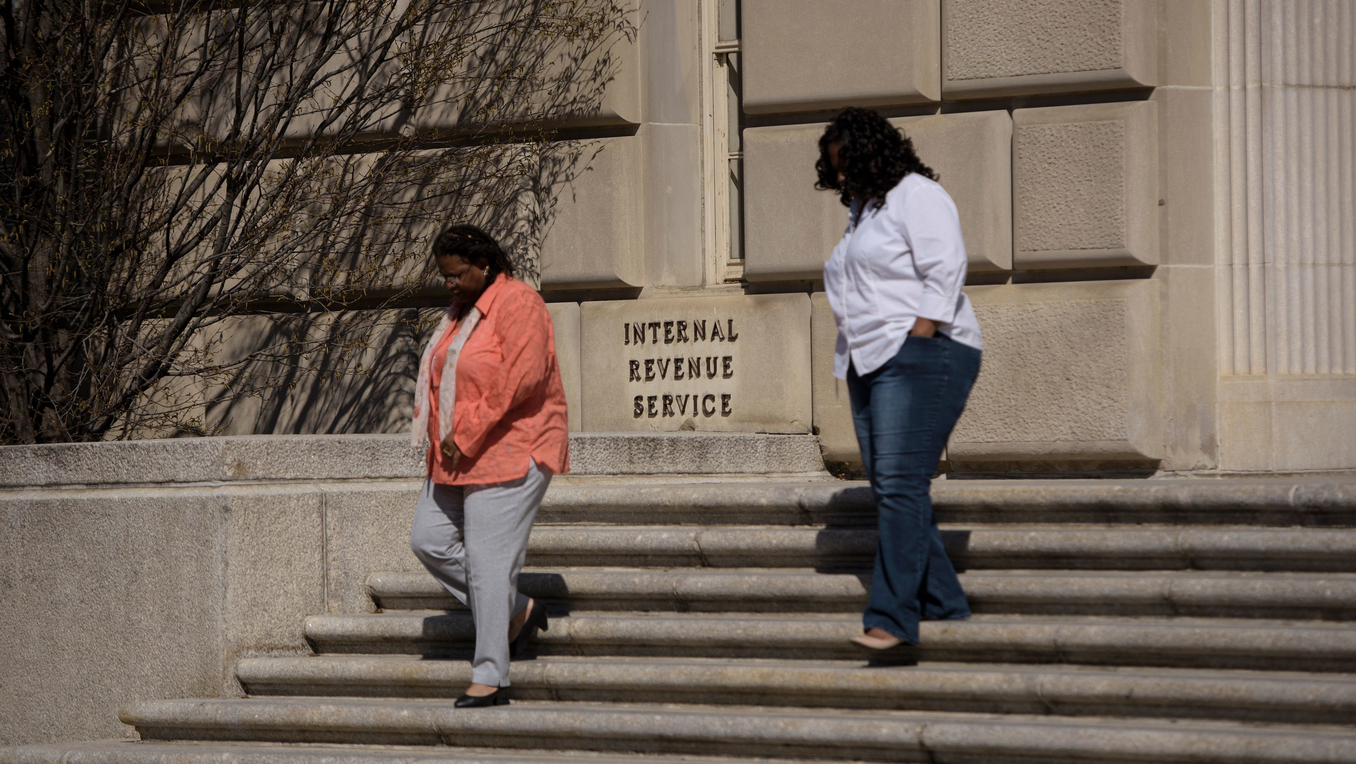The IRS says taxpayers should not call for updates on their cash payments; instead the agency counsels people check its website. (AFP via Getty Images)