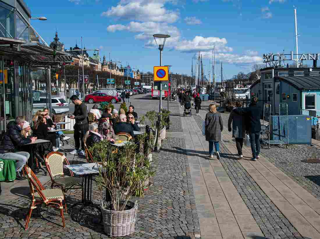 People gather in a restaurant on April 4, 2020 in Stockholm during the the new coronavirus COVID-19 pandemic. (Photo by Jonathan NACKSTRAND / AFP) (Photo by JONATHAN NACKSTRAND/AFP via Getty Images)
