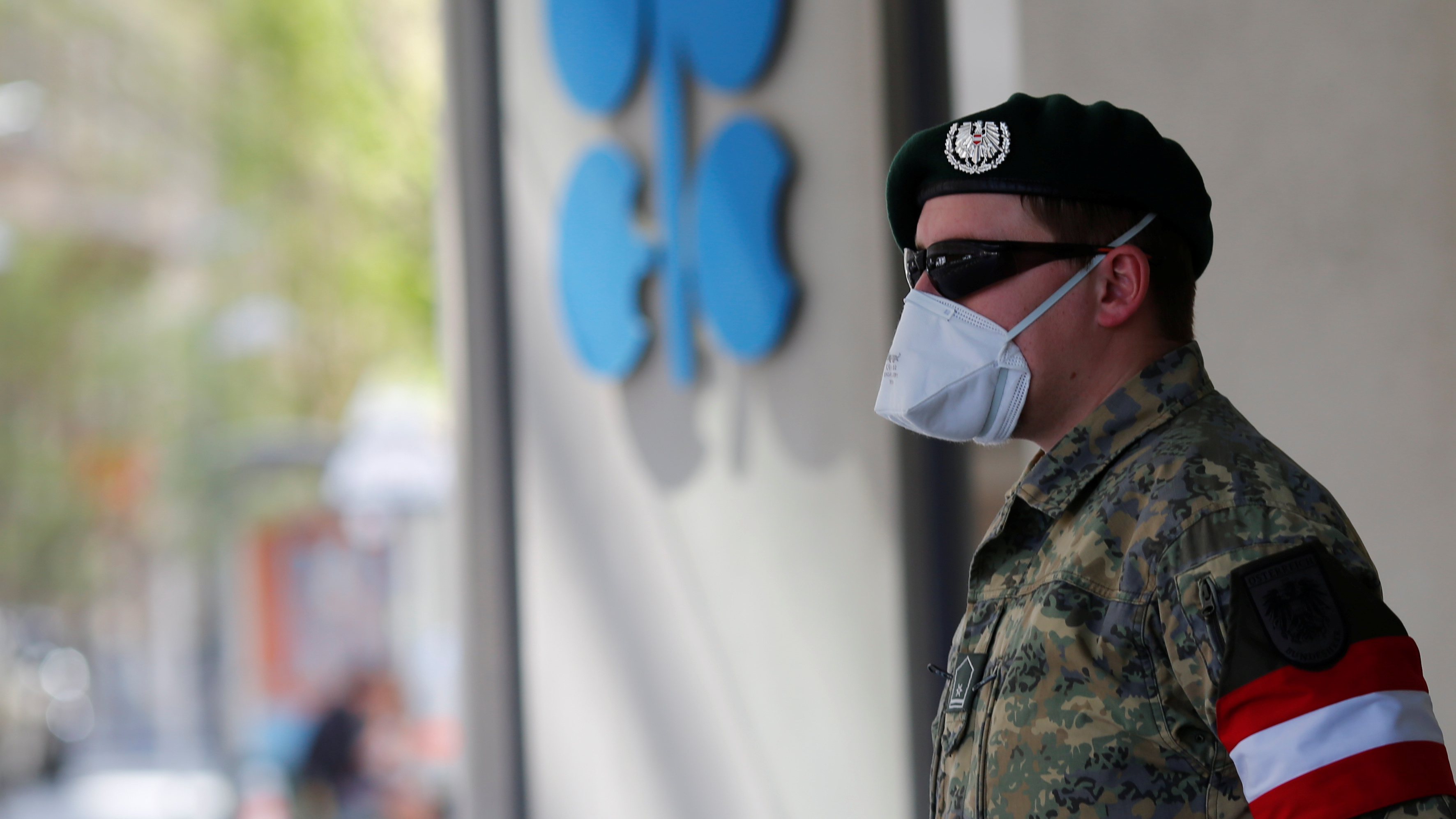 An Austrian army member stands in front of OPEC's headquarters in Vienna on Thursday. (Reuters)
