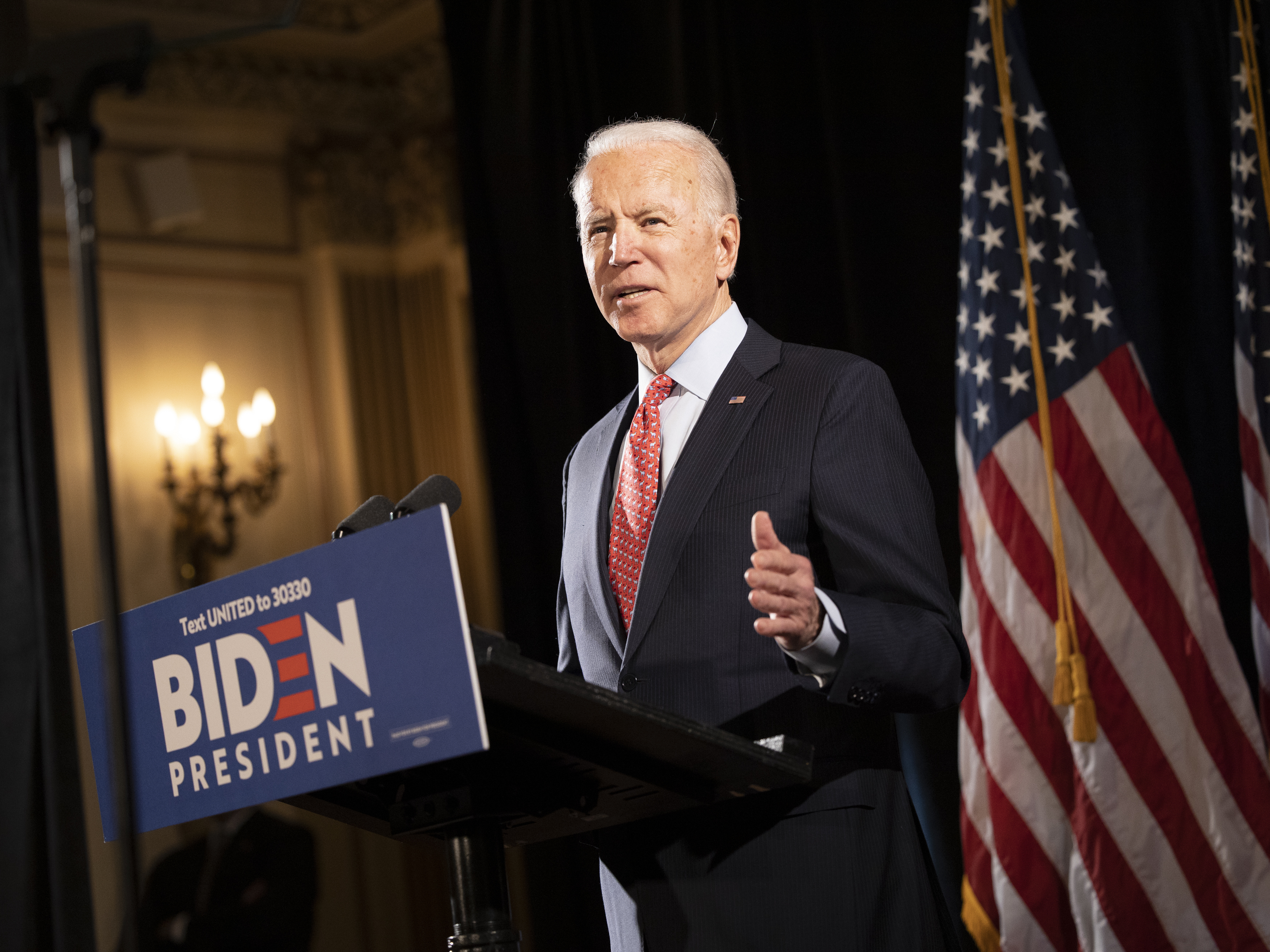Former Vice President Joe Biden at a press conference in Wilmington, Del., in mid-March. His bid this week to allow 60-year-olds to get Medicare &quot;reflects the reality,&quot; he says, &quot;that, even after the current crisis ends, older Americans are likely to find it difficult to secure jobs.&quot; (Bloomberg via Getty Images)