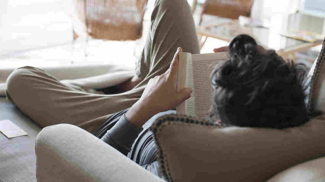 A man reads a book.