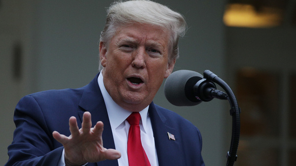President Trump addresses reporters in the White House Rose Garden during the daily coronavirus task force briefing on April 14.