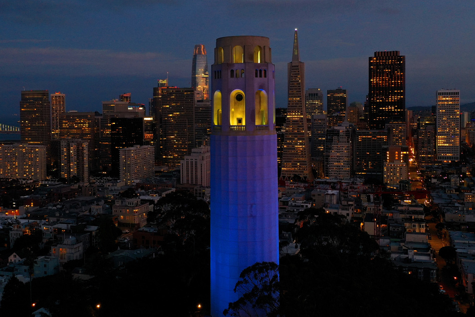 San Francisco's Coit Tower was lit up blue on April 9 as part of a nationwide tribute to health care workers and first responders on the front lines of the COVID-19 pandemic. (Justin Sullivan/Getty Images)
