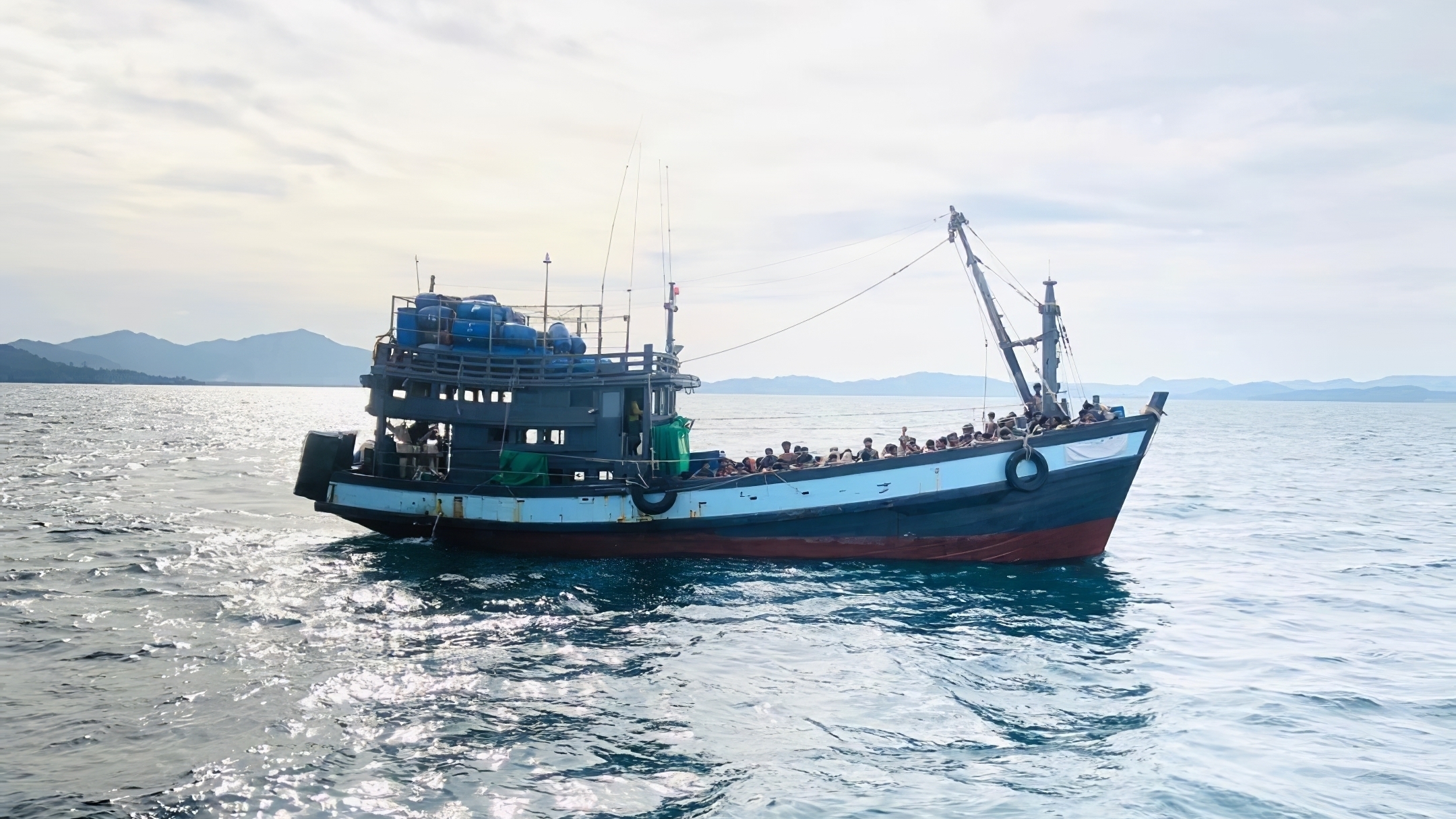 A handout photo released on April 5 by Malaysia shows a trawler carrying Rohingya migrants off the island of Langkawi. It was not immediately clear if it was the same vessel as rescued late Wednesday off Bangladesh