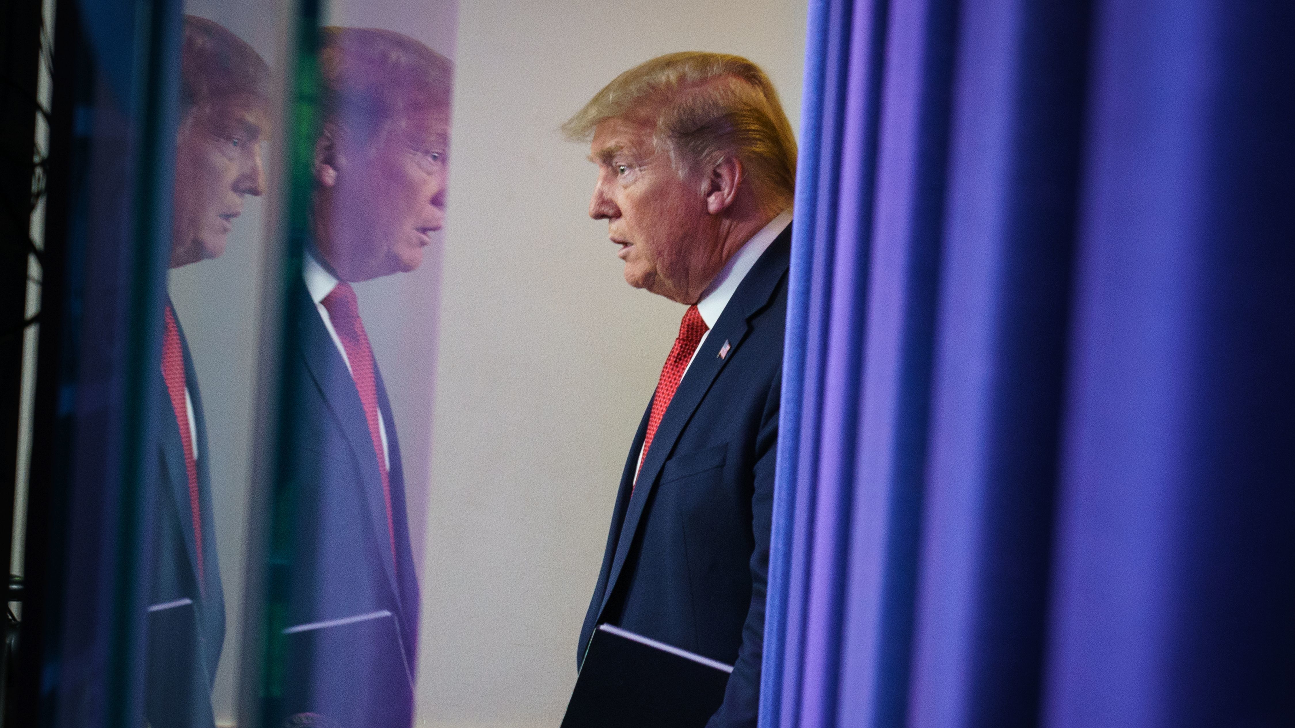 President Trump arrives for the coronavirus task force briefing at the White House on Thursday.