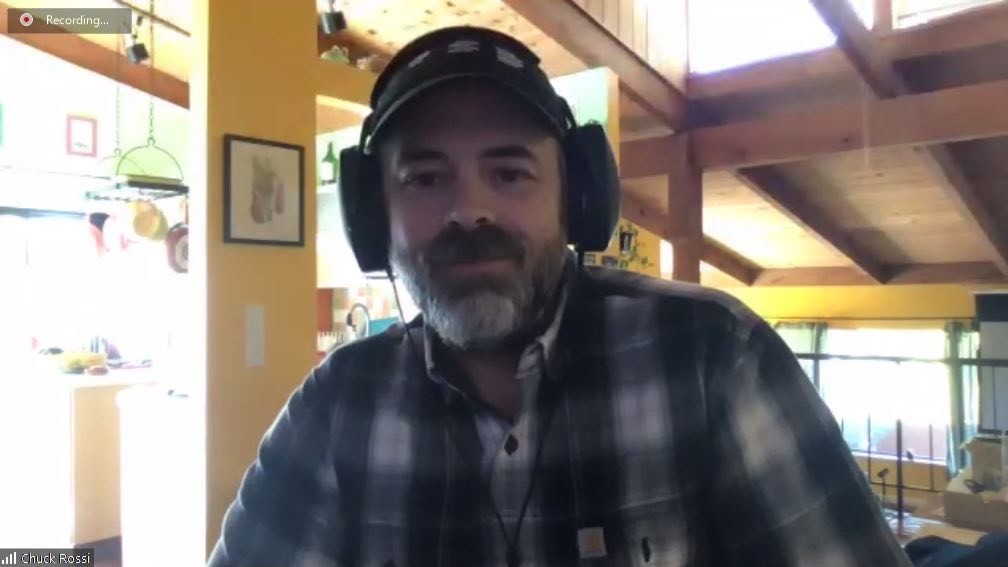 Chuck Rossi, the co-founder of Open Source Defense, at his home in California. He uses video conferences to connect with new gun owners. (Guns and America)