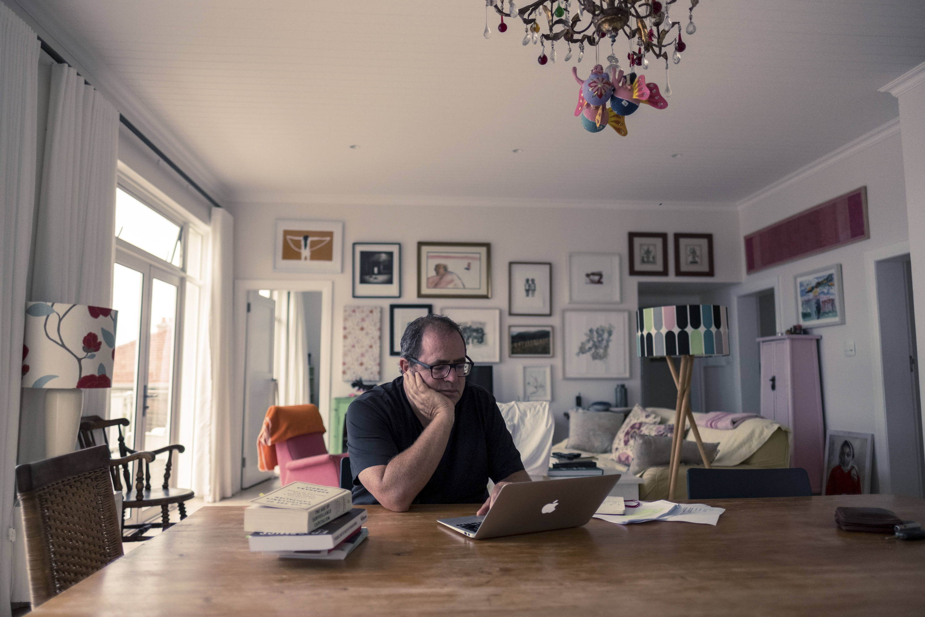 PHOTOS: Lockdown In The World's Most Unequal Country 10 Writer Mark Gevisser in his home in Kalk Bay, Cape Town, on day 16 of South Africa's coronavirus lockdown. He has written on how the lockdown calls into sharp relief the inequalities in his country.