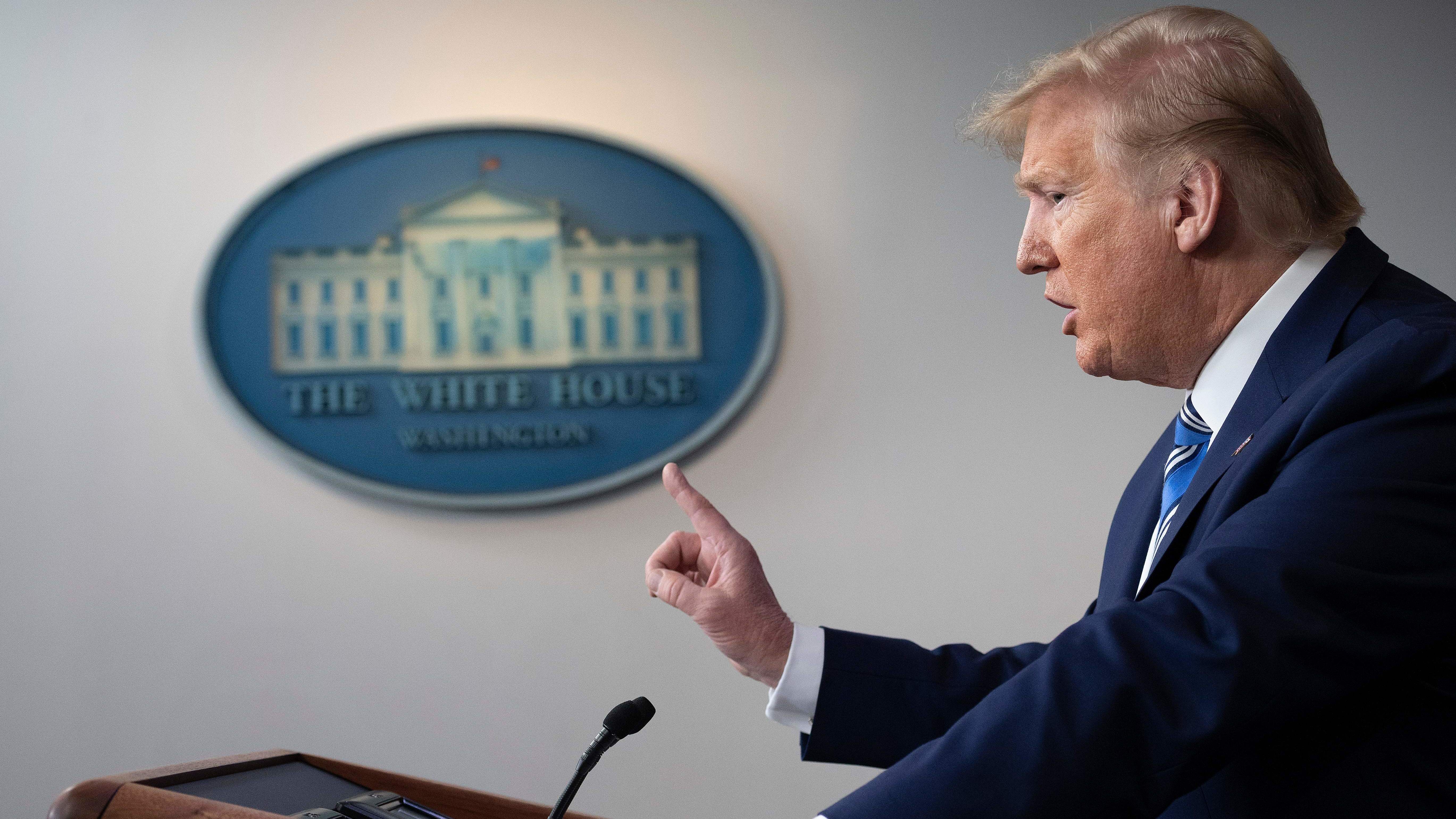 President Trump's guidelines for &quot;reopening&quot; the country put the onus on governors. (AFP via Getty Images)