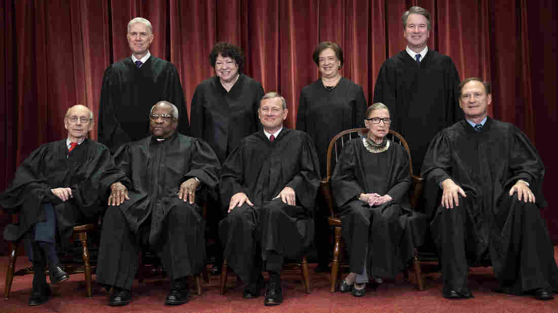 The justices of the U.S. Supreme Court: seated from left: Stephen Breyer, Clarence Thomas, Chief Justice John G. Roberts, Ruth Bader Ginsburg and Samuel Alito Jr. Standing behind from left: Neil Gorsuch, Sonia Sotomayor, Elena Kagan and Brett M. Kavanaugh.
