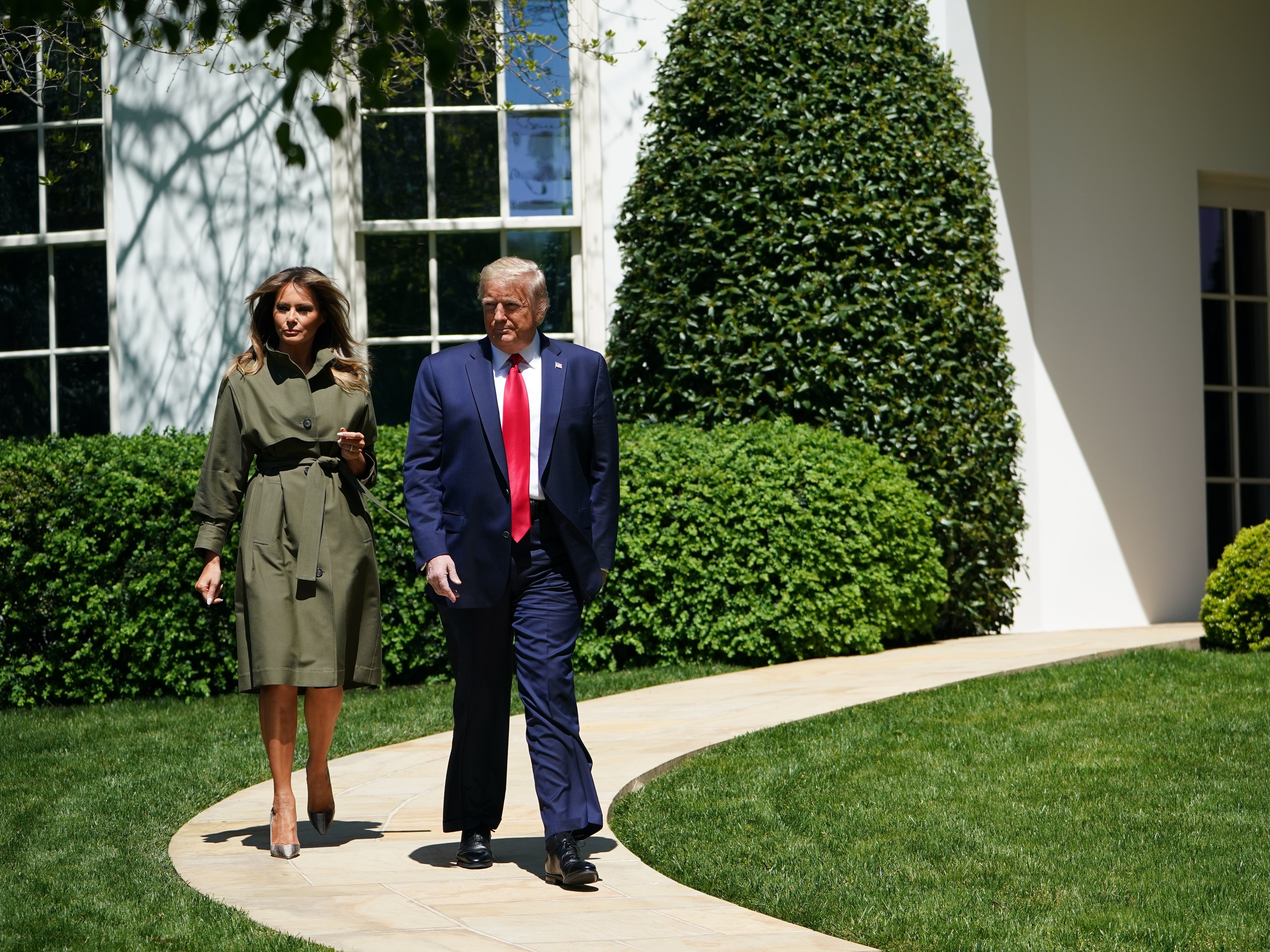 President Trump and first lady Melania Trump take part in a ceremony at the White House to mark Earth Day. (AFP via Getty Images)