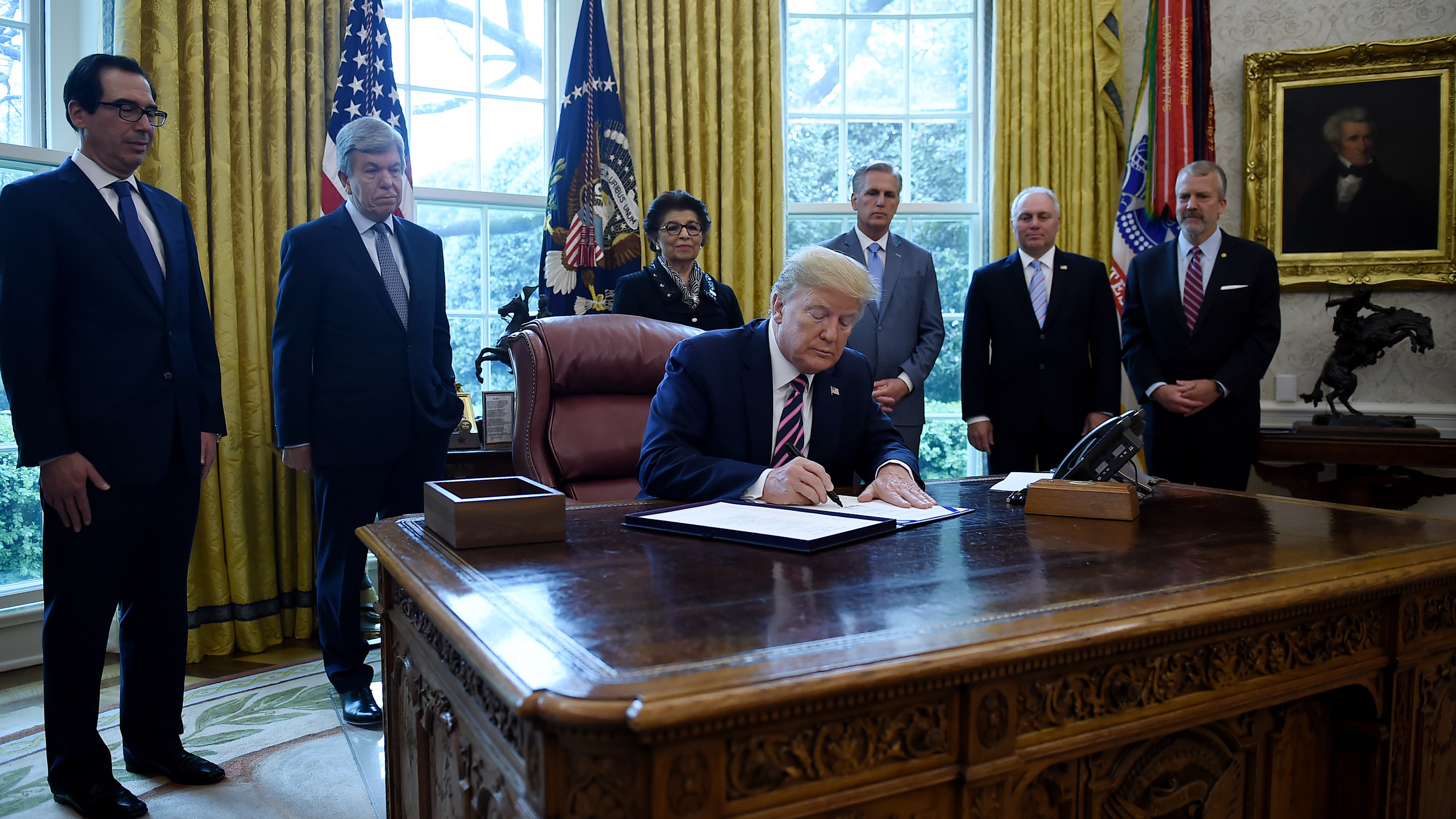 President Trump on Friday signed about $484 billion more in relief funds amid the coronavirus pandemic. (AFP via Getty Images)