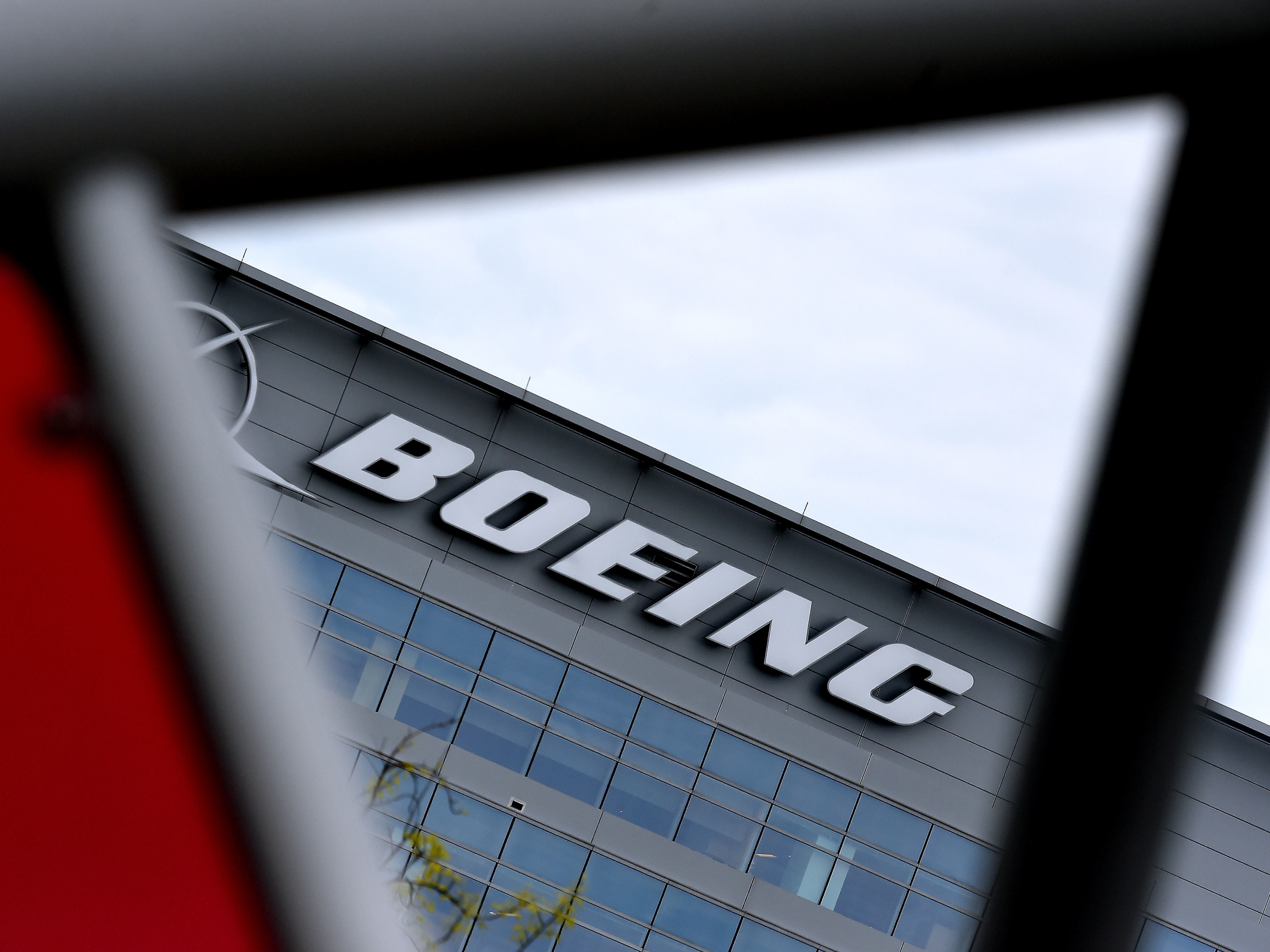 The Boeing headquarters is seen amid the coronavirus pandemic on April 29, in Arlington, Va. Boeing announced sweeping cost-cutting measures Wednesday after reporting a first-quarter loss of $641 million following the hit to the airline business from the coronavirus pandemic. (AFP via Getty Images)