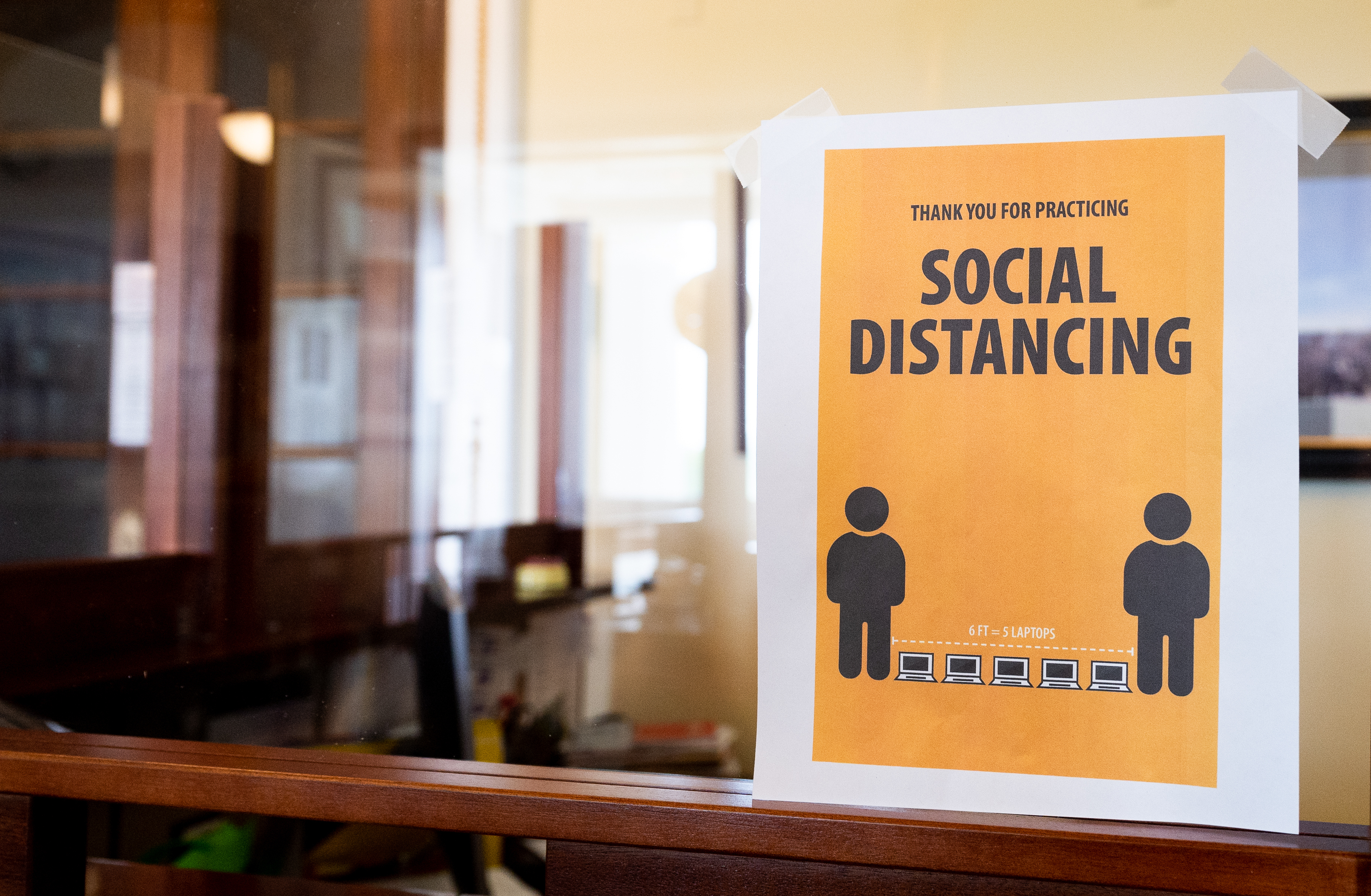 A coronavirus awareness sign around the U.S. Capitol encourages social distancing. (Echoes Wire/Barcroft Media/Getty Images)
