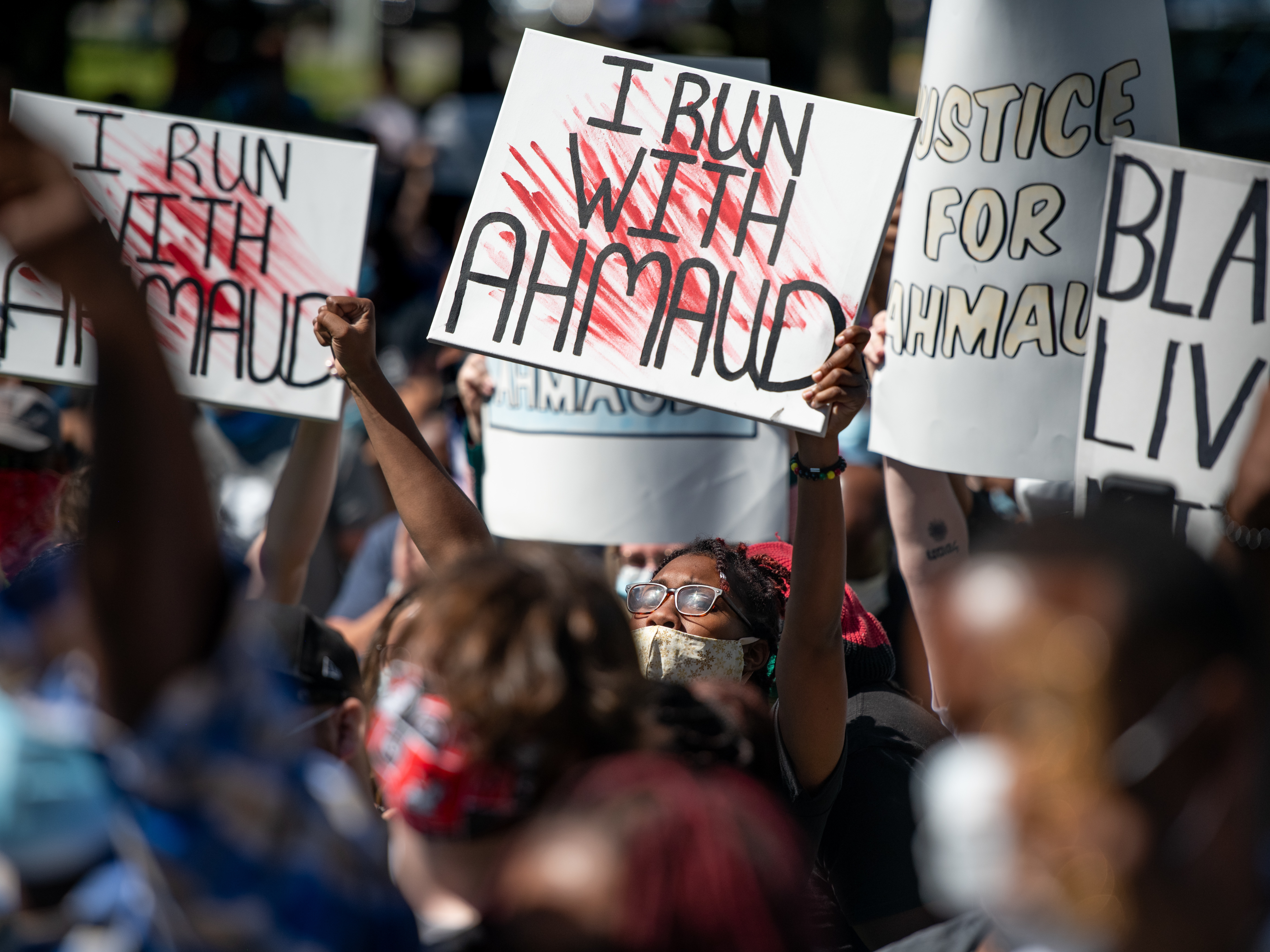 Demonstrators protest the shooting death of Ahmaud Arbery at the Glynn County Courthouse on May 8 in Brunswick, Ga. (Getty Images)