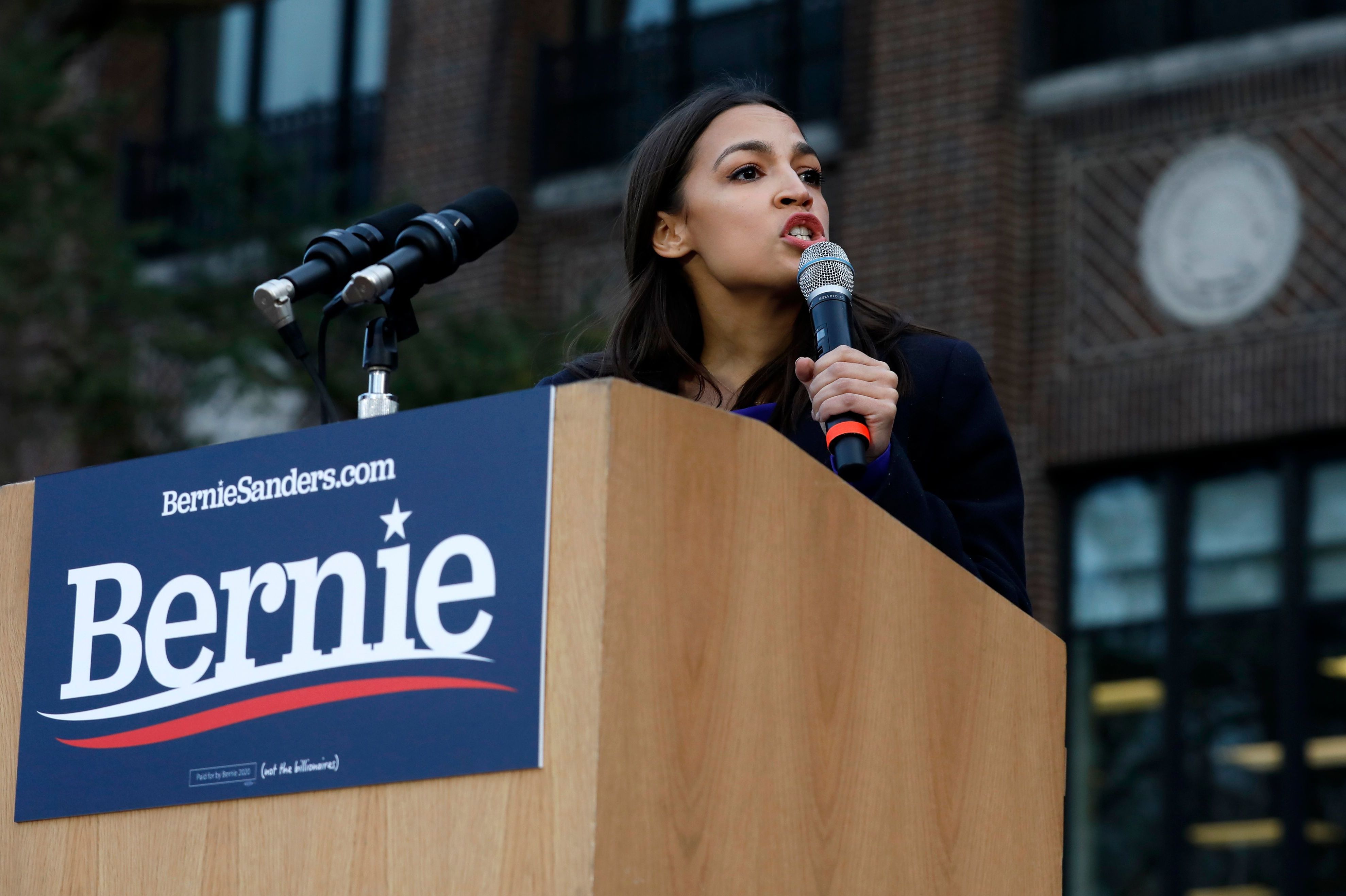 Rep. Alexandria Ocasio-Cortez, seen here speaking at a campaign event for Bernie Sanders in March, has been named co-chair of a climate change task force to support party unity. (AFP via Getty Images)