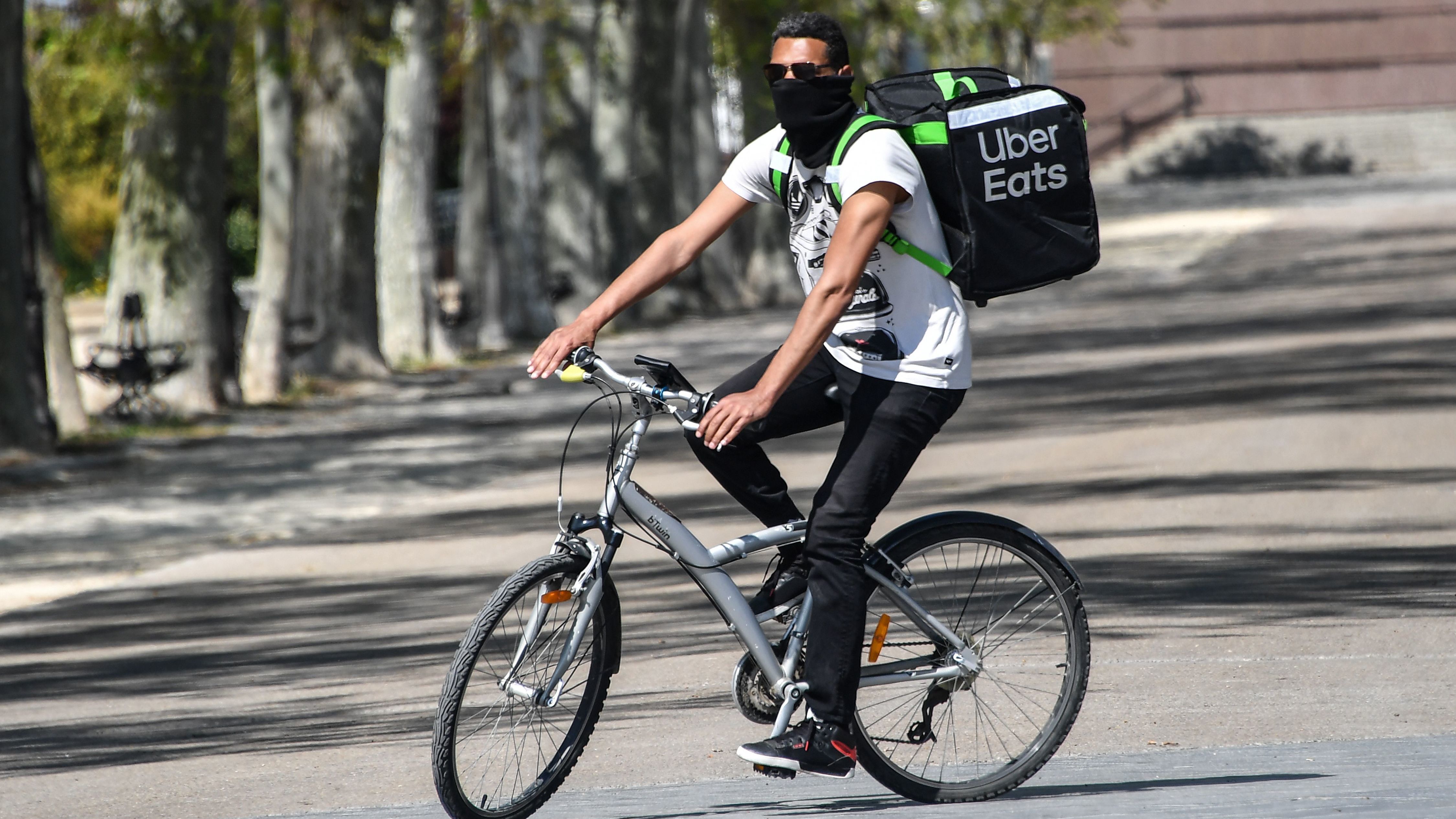 Uber is restructuring its business to focus on rides and food delivery, which has been a bright spot for the company during the pandemic. (AFP via Getty Images)