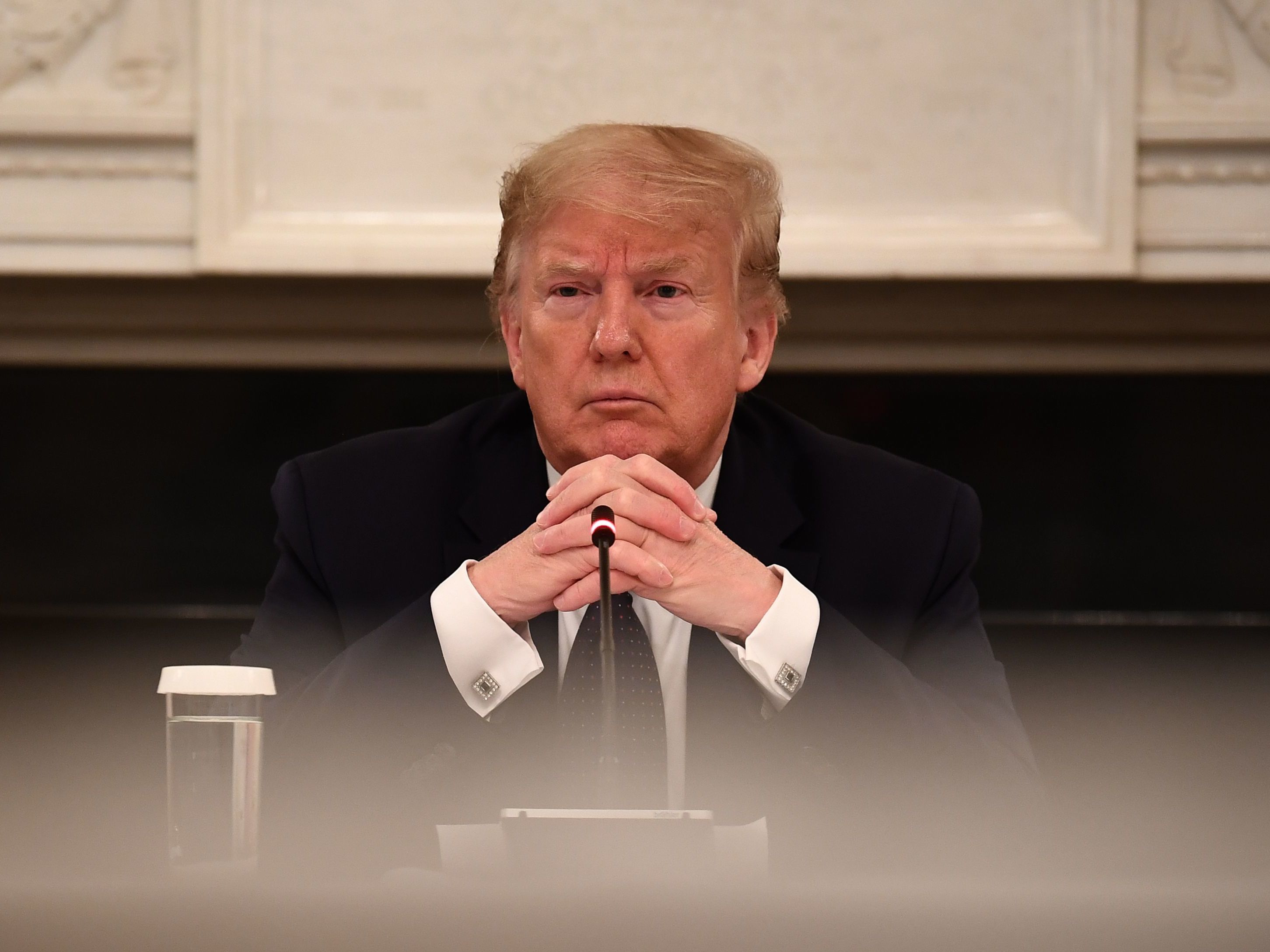 President Trump looks on during a meeting with restaurant executives in the White House on Monday. (AFP via Getty Images)