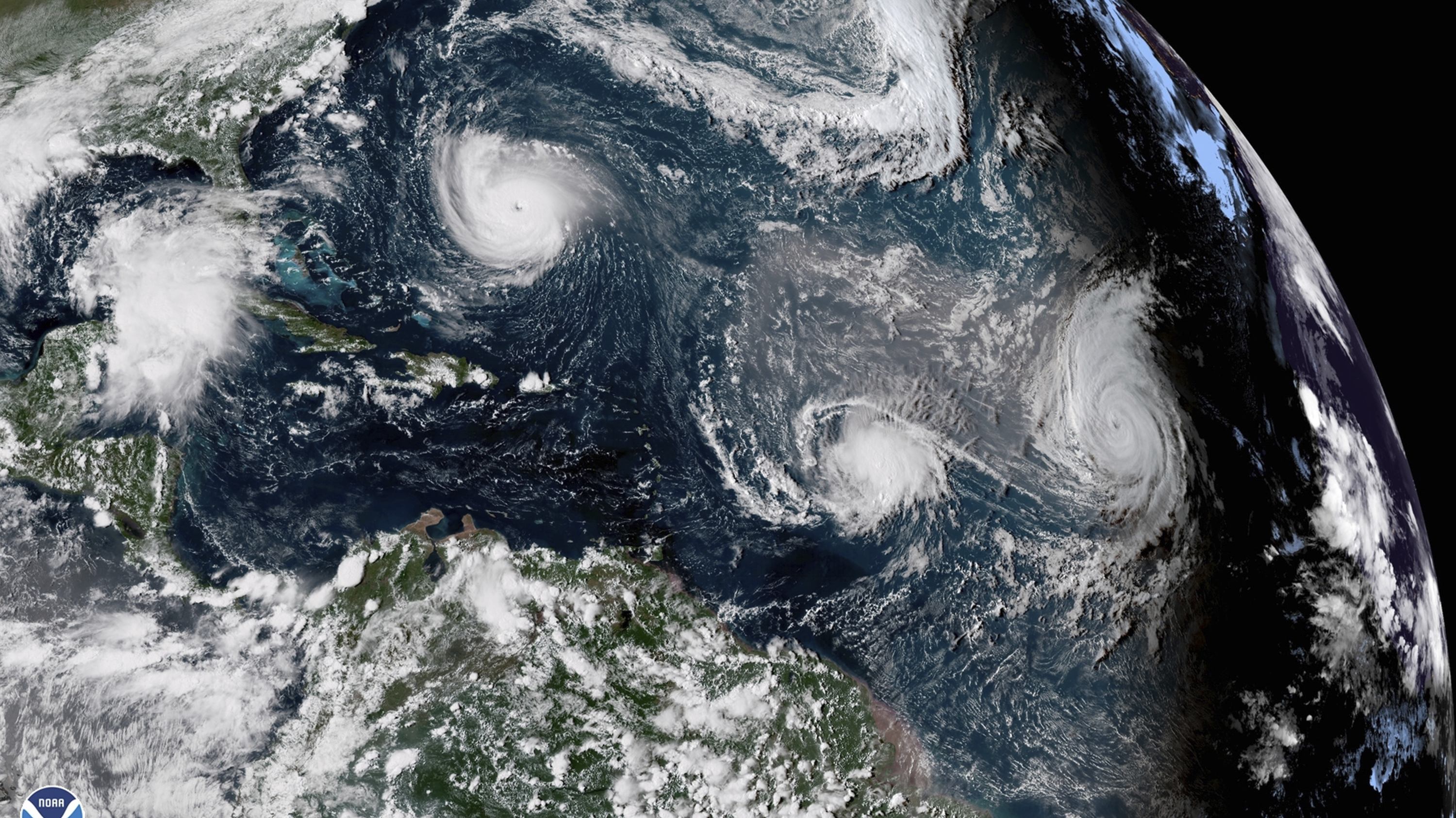 Three hurricanes form in the Atlantic in September 2018. Forecasters predict three to six major hurricanes during the 2020 season, which is above average.