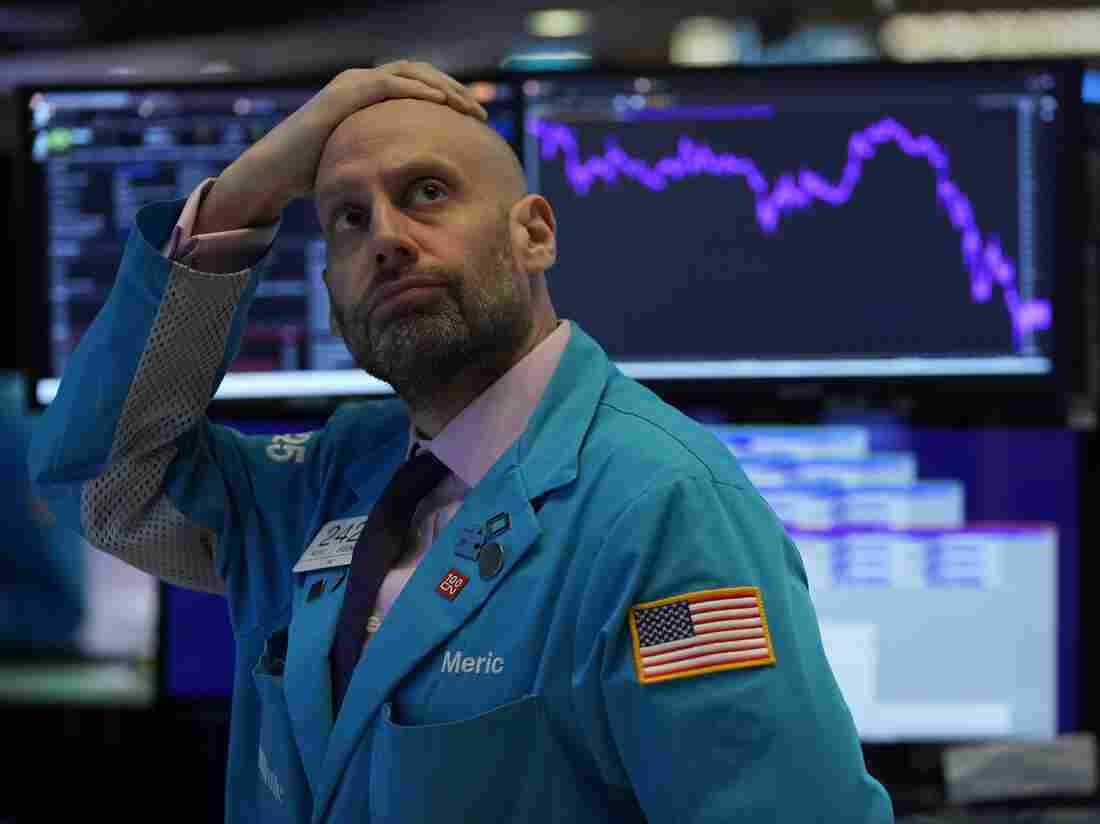 Meric Greenbaum, Designated Market Maker IMC financial looks up at the board before the opening bell right before trading halted on the New York Stock Exchange on March 9, 2020 in New York. (Photo by TIMOTHY A. CLARY/AFP via Getty Images)