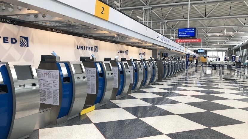An empty terminal at Chicago's O'Hare International Airport. The normally bustling check-in at the United Airlines terminal was eerily quiet on April 24. (NPR)
