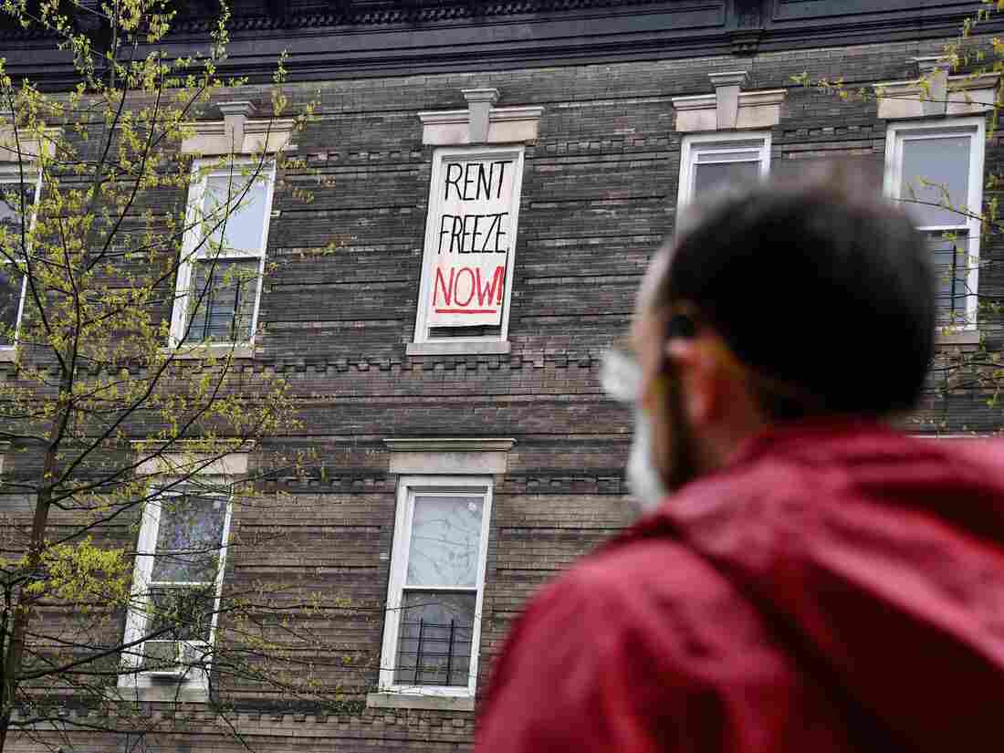 TOPSHOT - Crown Heights building tenant Sean Riley stages a rent strike on May 1, 2020 in New York City. (Photo by Angela Weiss / AFP) (Photo by ANGELA WEISS/AFP via Getty Images)