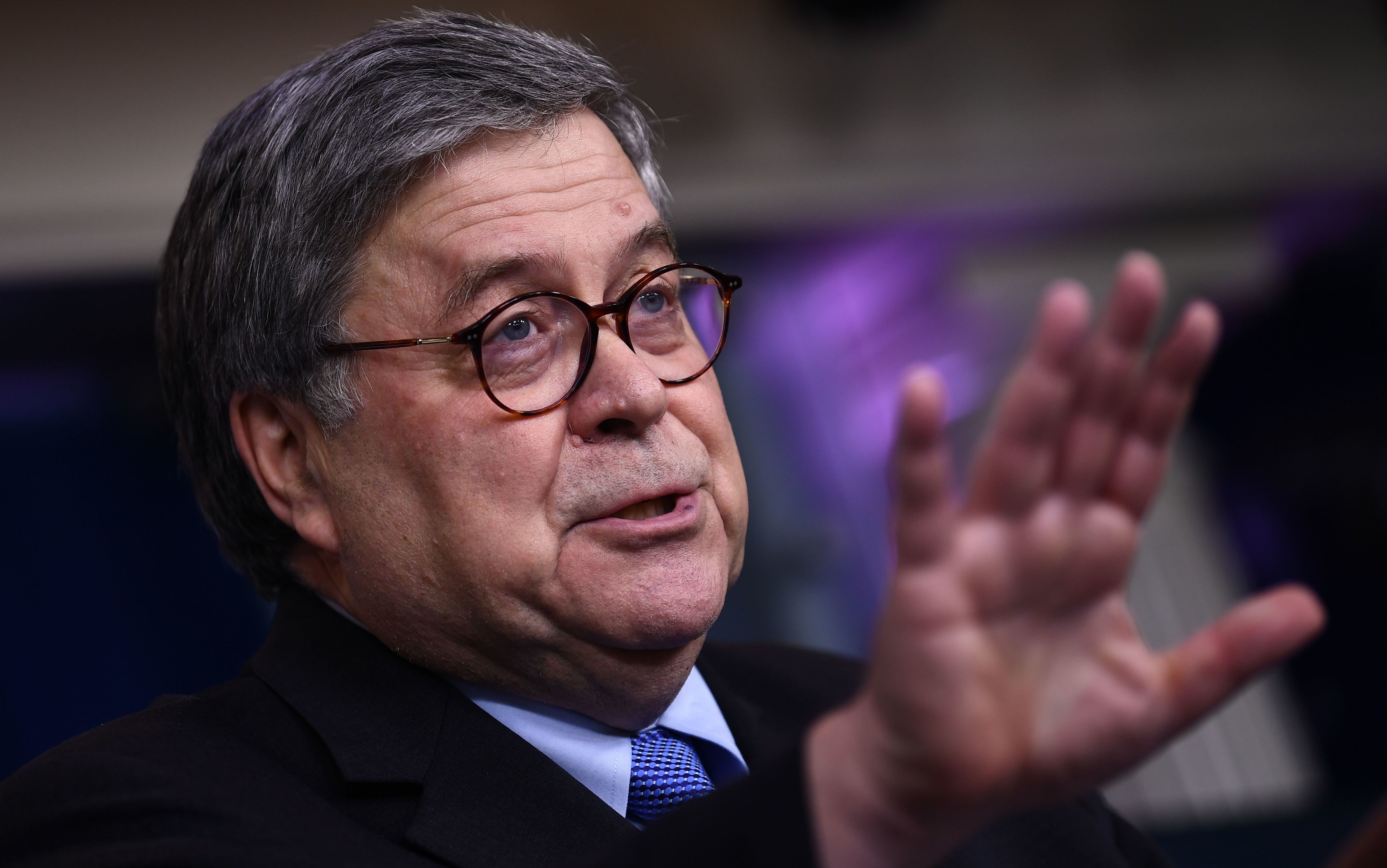 Attorney General William Barr, pictured at a press briefing in March, has voiced opposition to the latest surveillance legislation after backing an earlier version. (AFP via Getty Images)