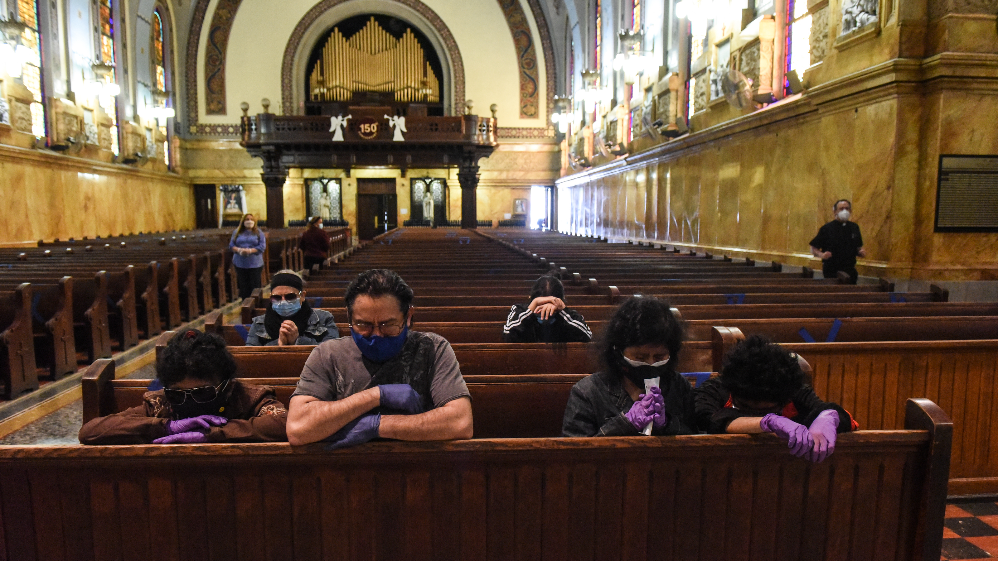 People pray inside St. Michael